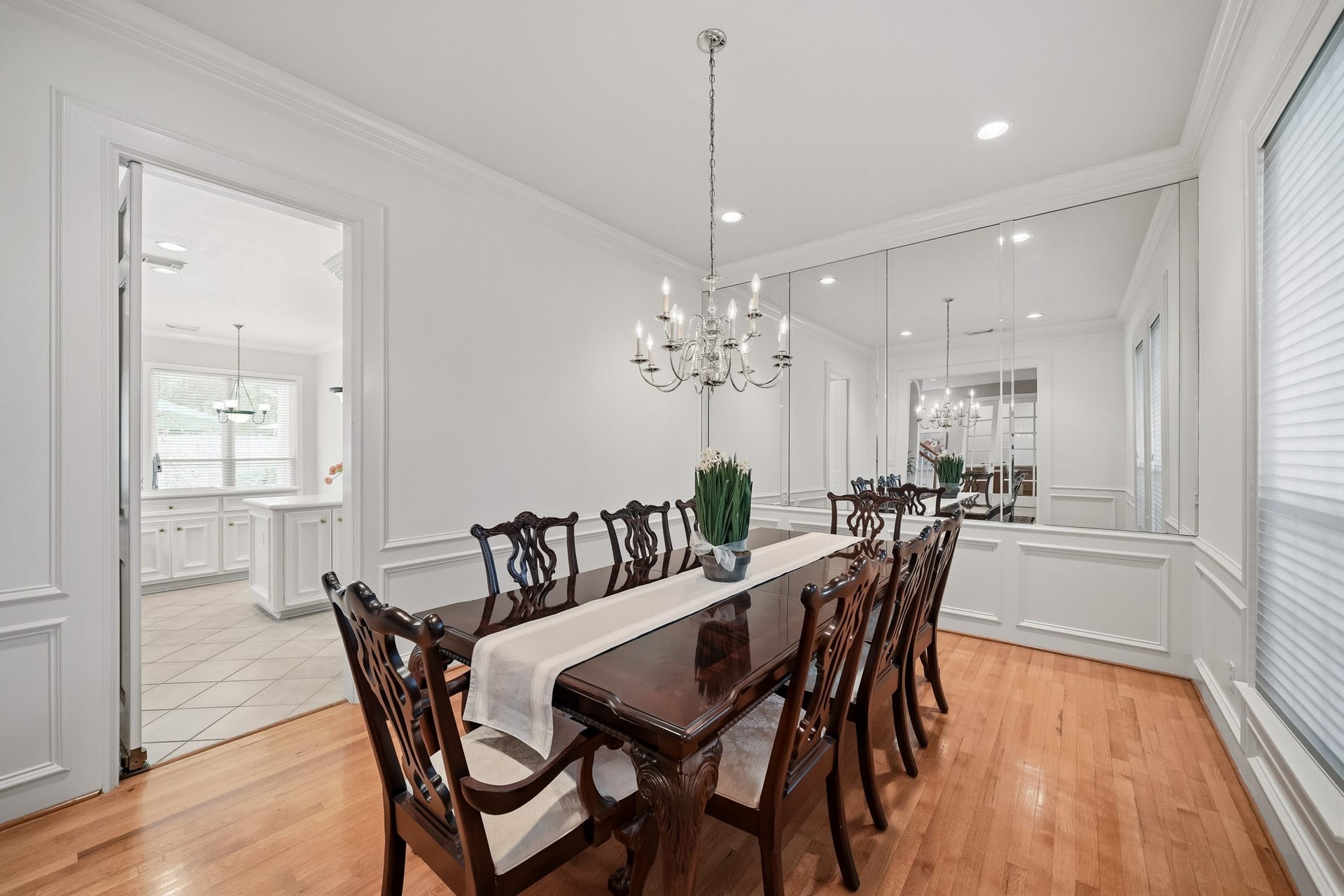 The recently painted formal dining room with access to the kitchen.