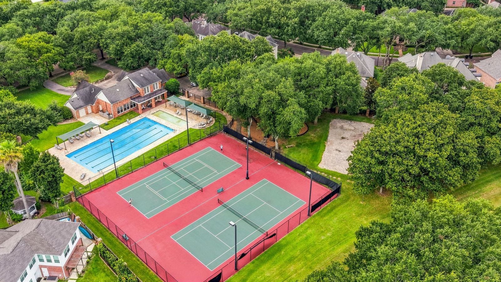 Oyster Point is a small enclave of about 100 custom homes. Only Oyster Point Residents have access to the lap pool, baby pool, clubhouse, tennis courts, pickleball courts, park and playground. As members of FCCSA, residents have access to many other pools and amenities in First Colony, such as water parks and kayaking. Oyster Creek/Lost creek park is within walking distance and offers hike and bike trails, soccer courts and picnic areas.