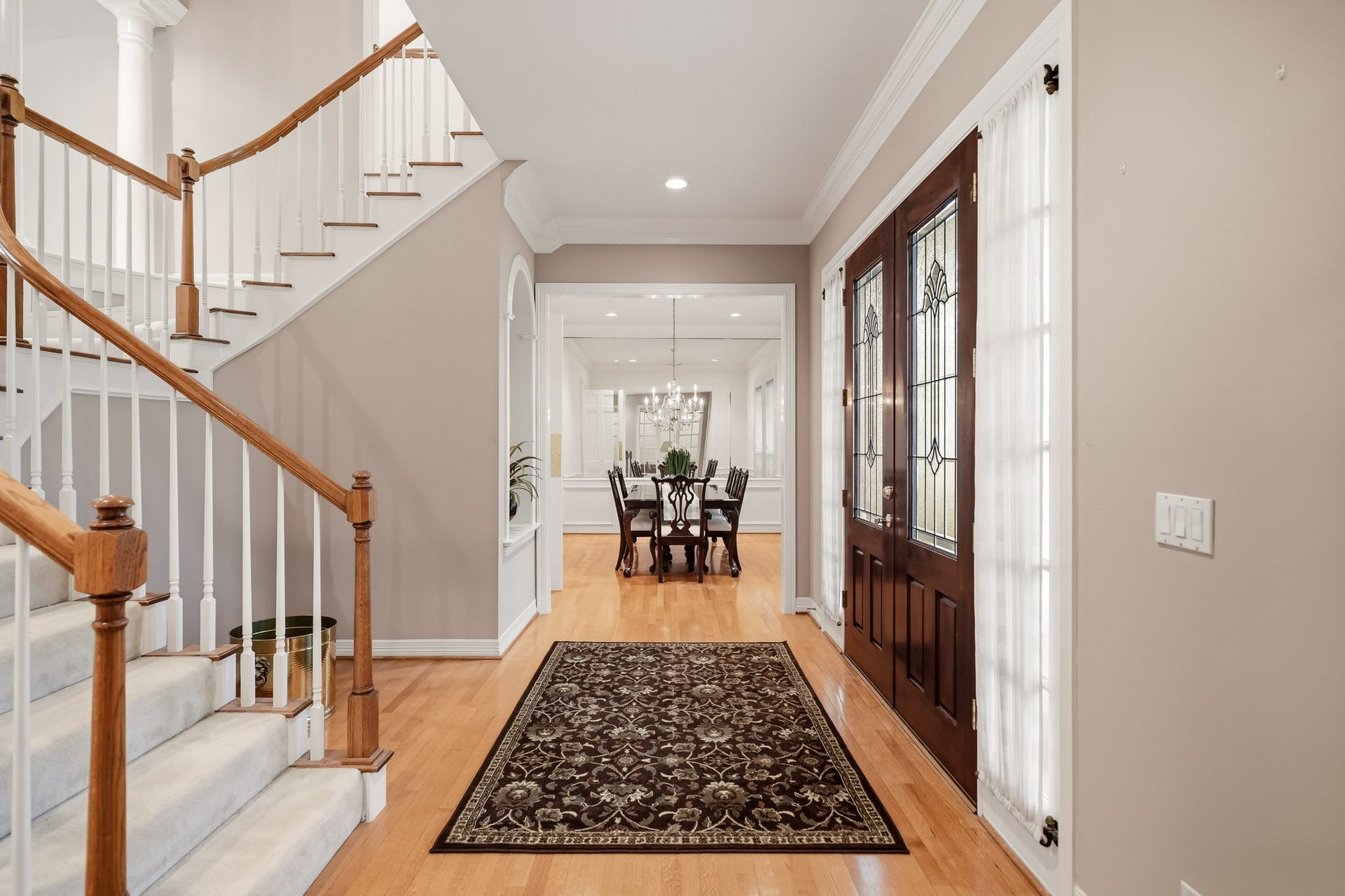 To the right upon entering is the formal dining area.