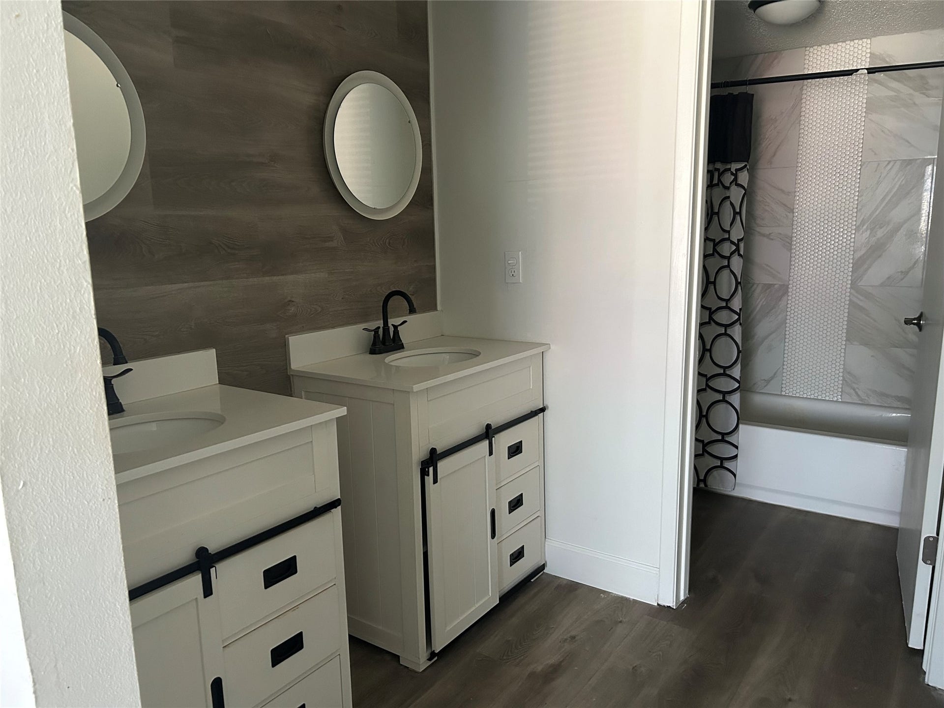 6119 Dryad Drive, Houston, TX 77035 Master bath with double sink and shower and tub.