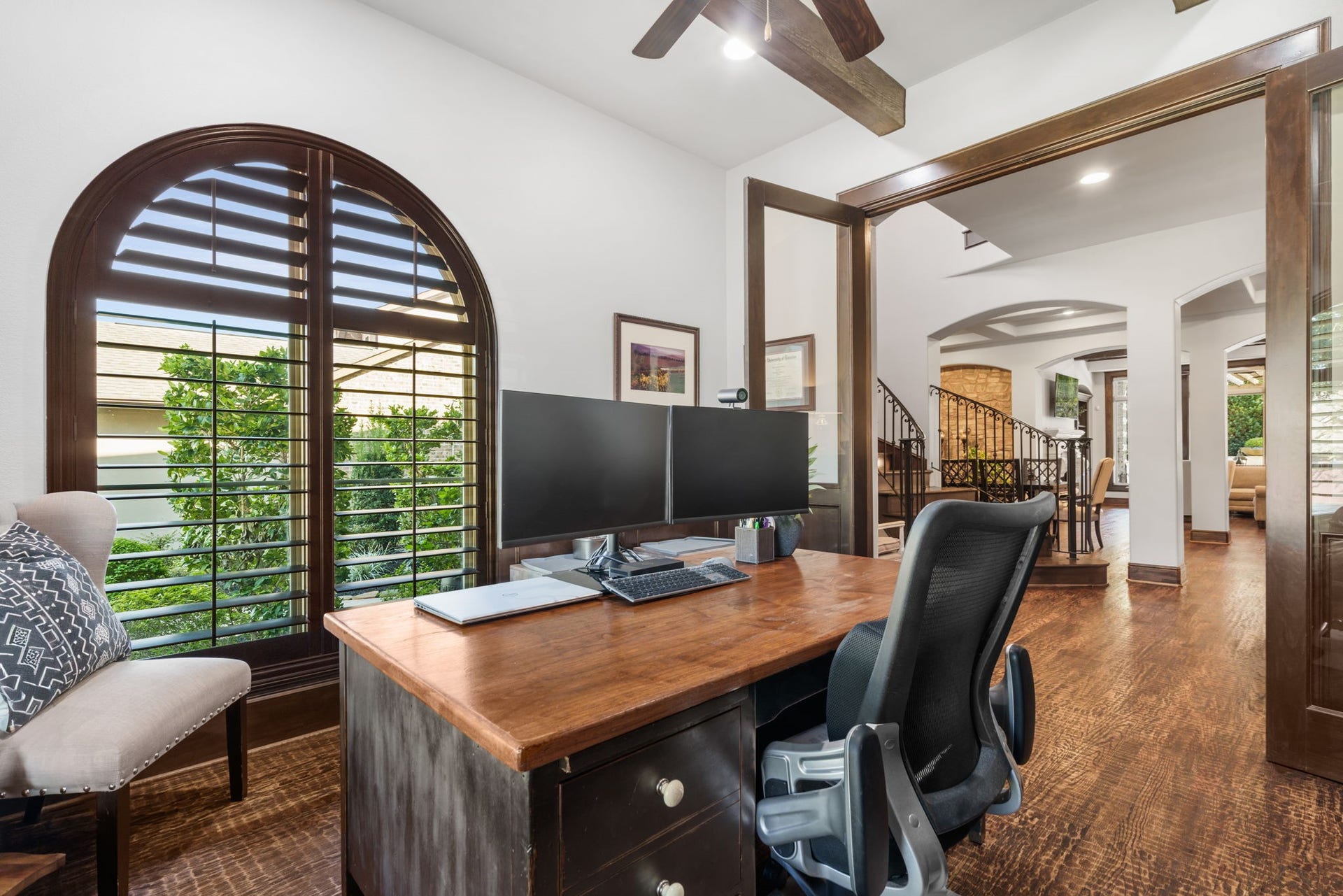 126 Summer Holly Drive, Conroe, TX 77384 Glass-paneled French doors provide privacy while maintaining an open, connected feel to the home's main living areas.