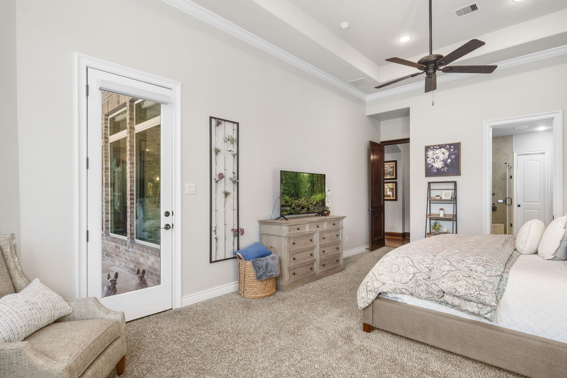 126 Summer Holly Drive, Conroe, TX 77384 Convenient private access to the covered patio, creating a seamless connection between indoor and outdoor living.