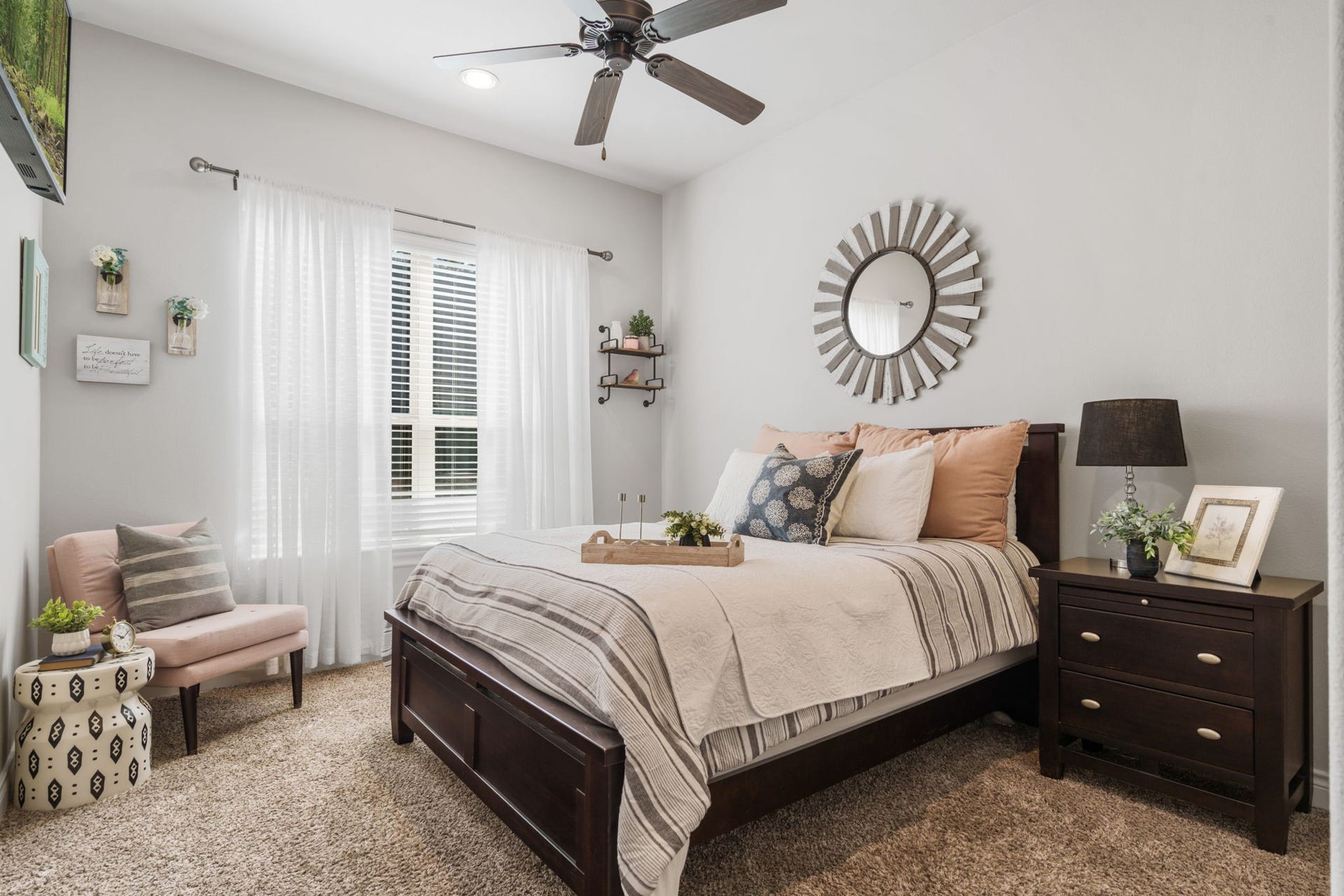 126 Summer Holly Drive, Conroe, TX 77384 Spacious downstairs secondary bedroom with abundant natural light and convenient access to a full bathroom.