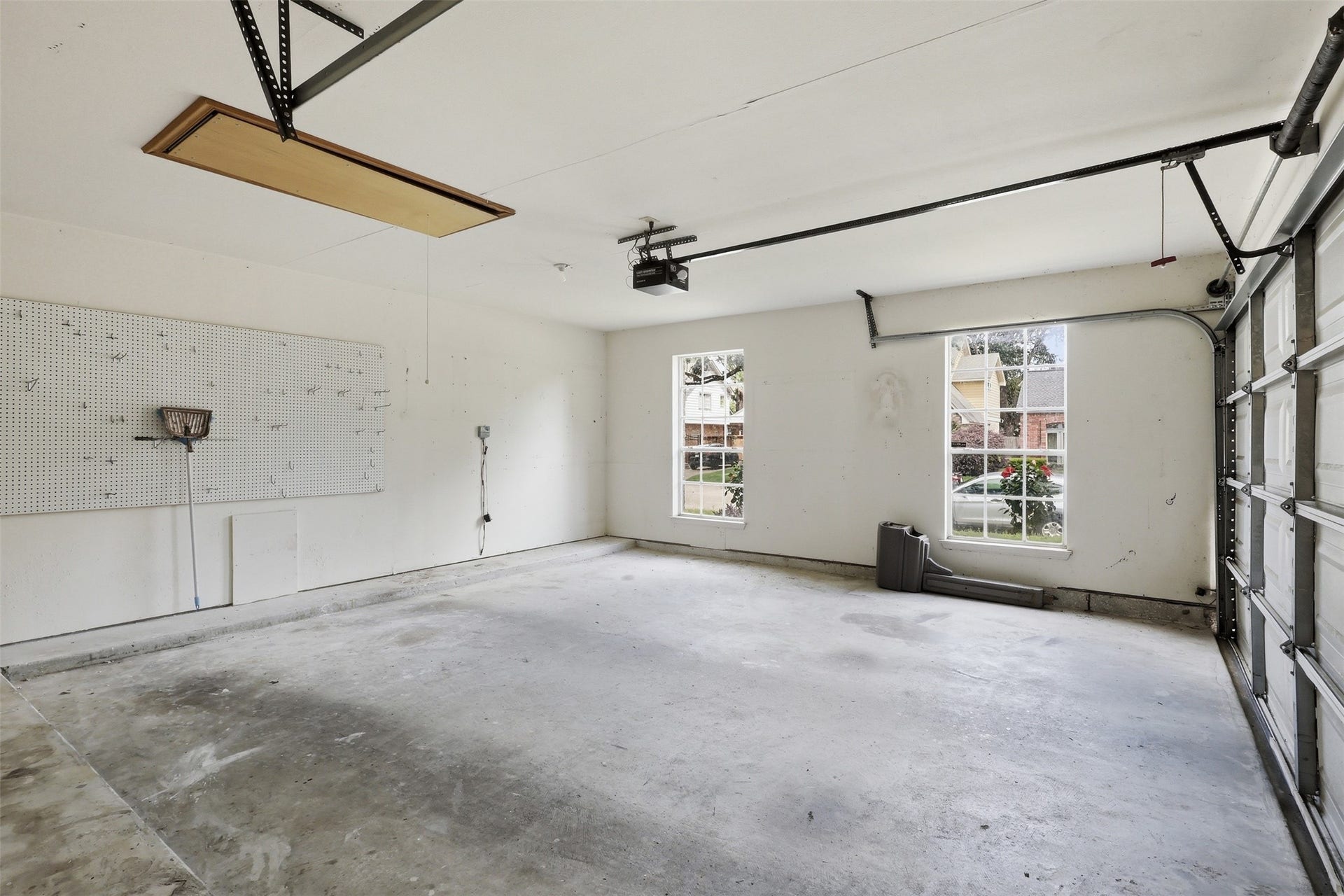 10707 Crestfield Court, Houston, TX 77070 Two-car garage with room for parking and storage