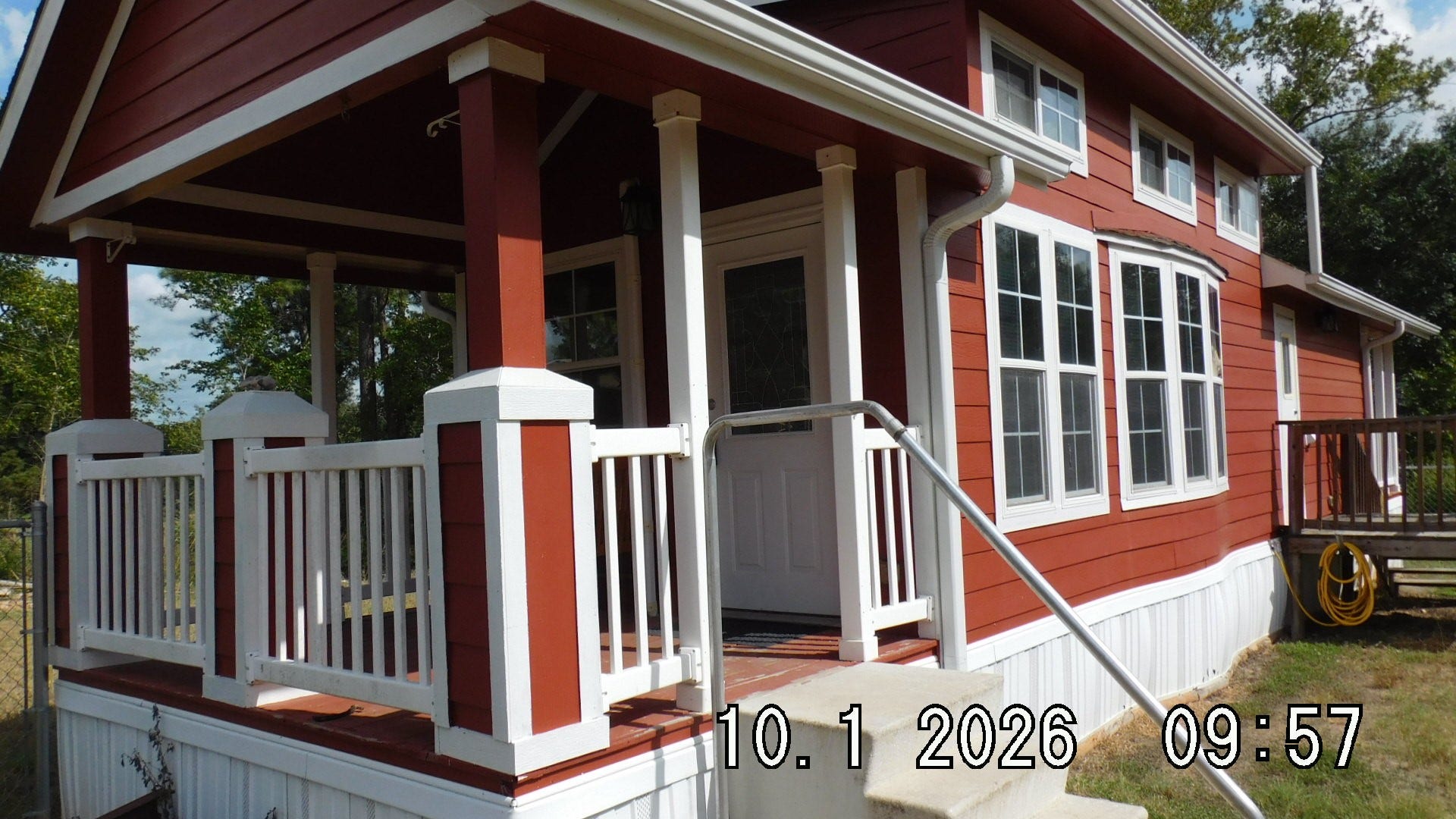 12000 FM 1484 Road, Conroe, TX 77303 Front Porch and Side View.