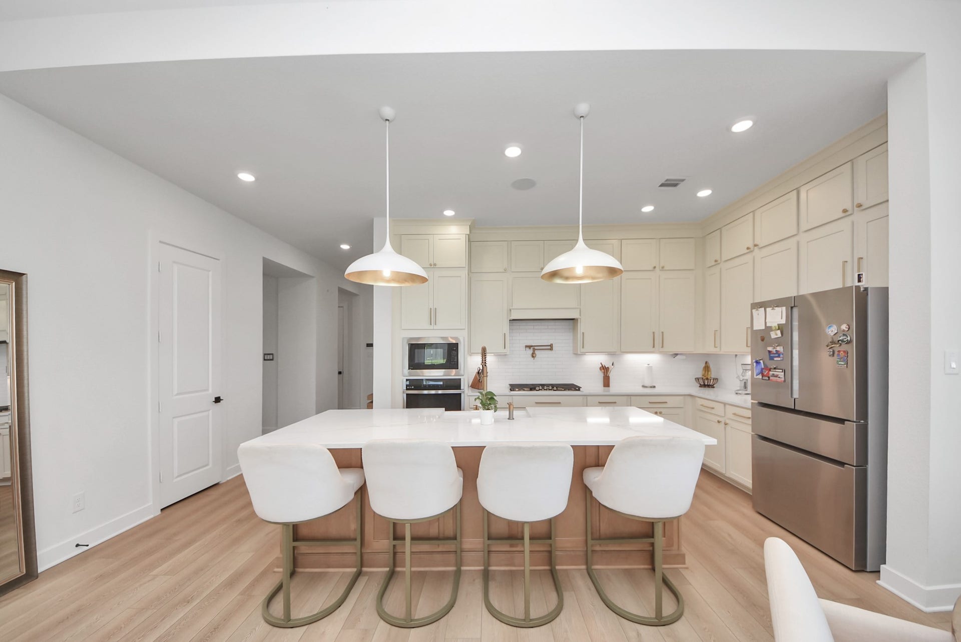2995 Tantara Drive, Katy, TX 77493 Elegant kitchen with a spacious island, sleek stainless steel appliances, and ample cabinetry, perfect for culinary enthusiasts.