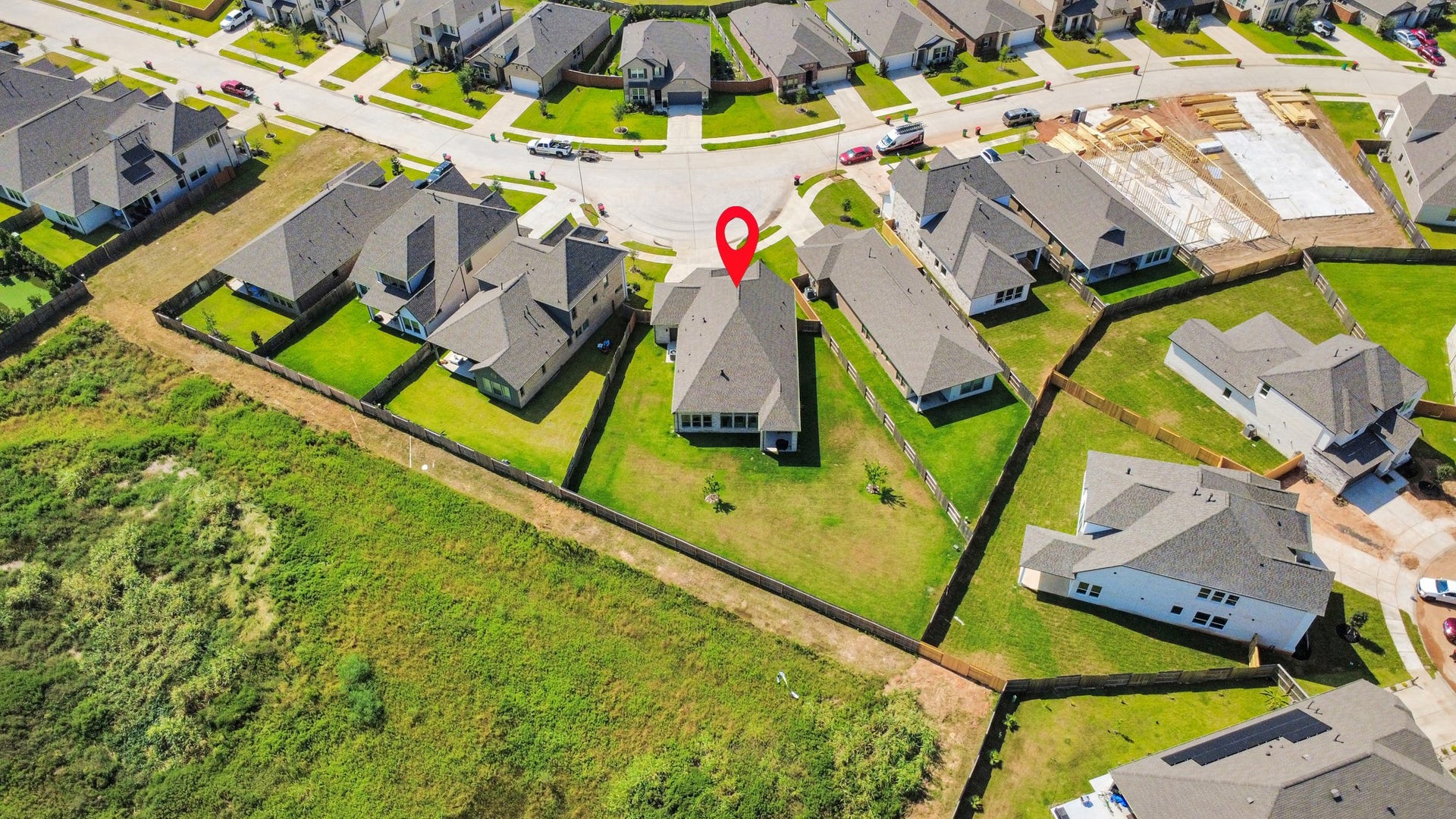 2995 Tantara Drive, Katy, TX 77493 Charming home nestled in a peaceful cul-de-sac, featuring a spacious backyard with lush green surroundings and privacy fencing. Ideal for families seeking a serene neighborhood setting.