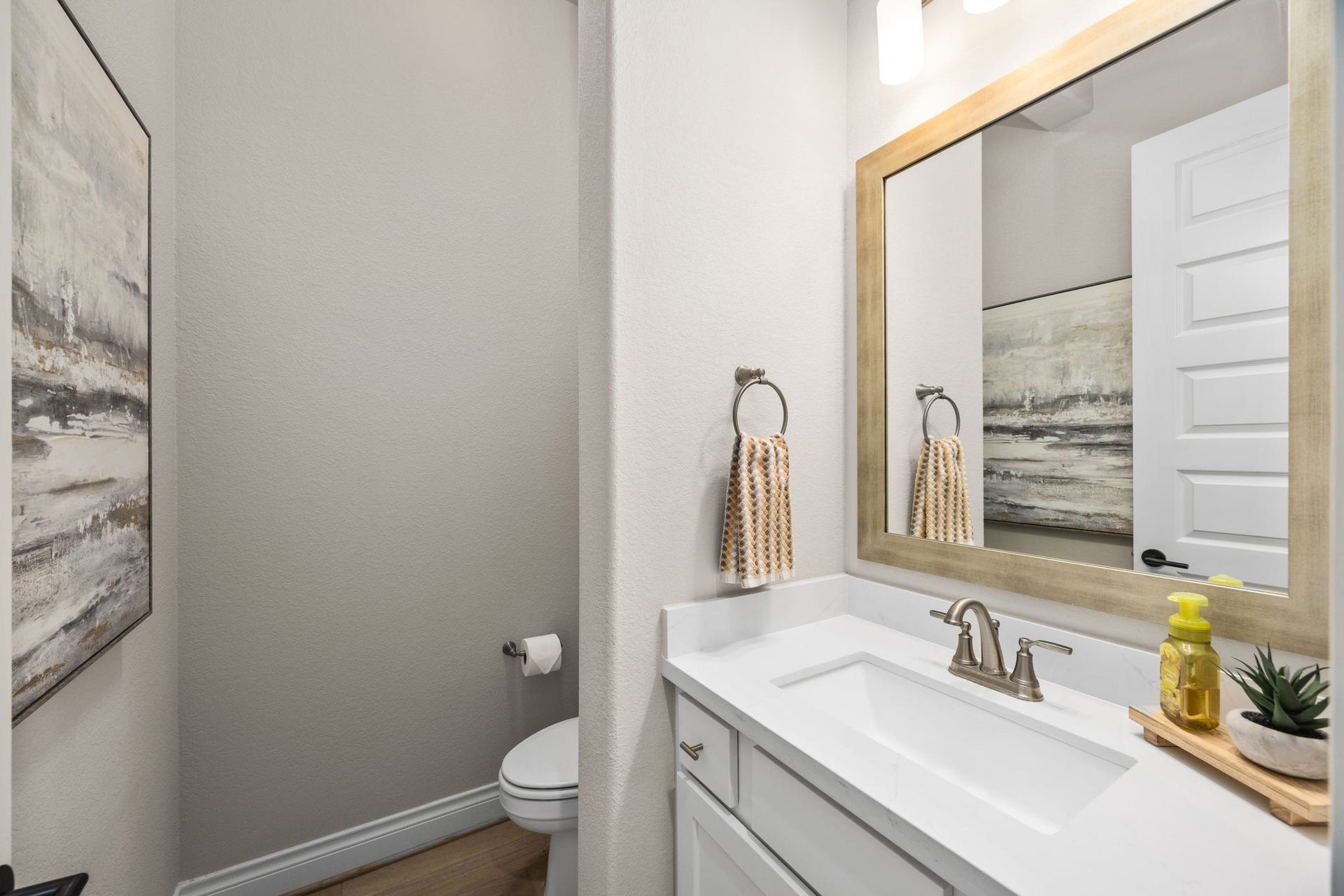 7403 Kinglet Court, Katy, TX 77493 Hall powder bath at the entry by the office