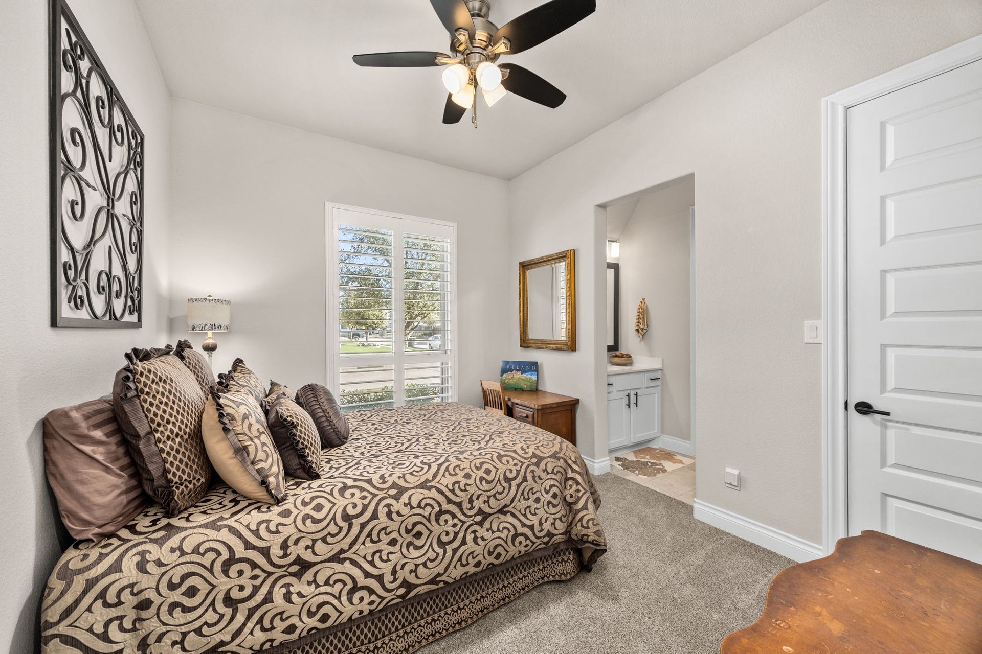 7403 Kinglet Court, Katy, TX 77493 Bedroom #1 shown with a queen size bed. Large closet to the right