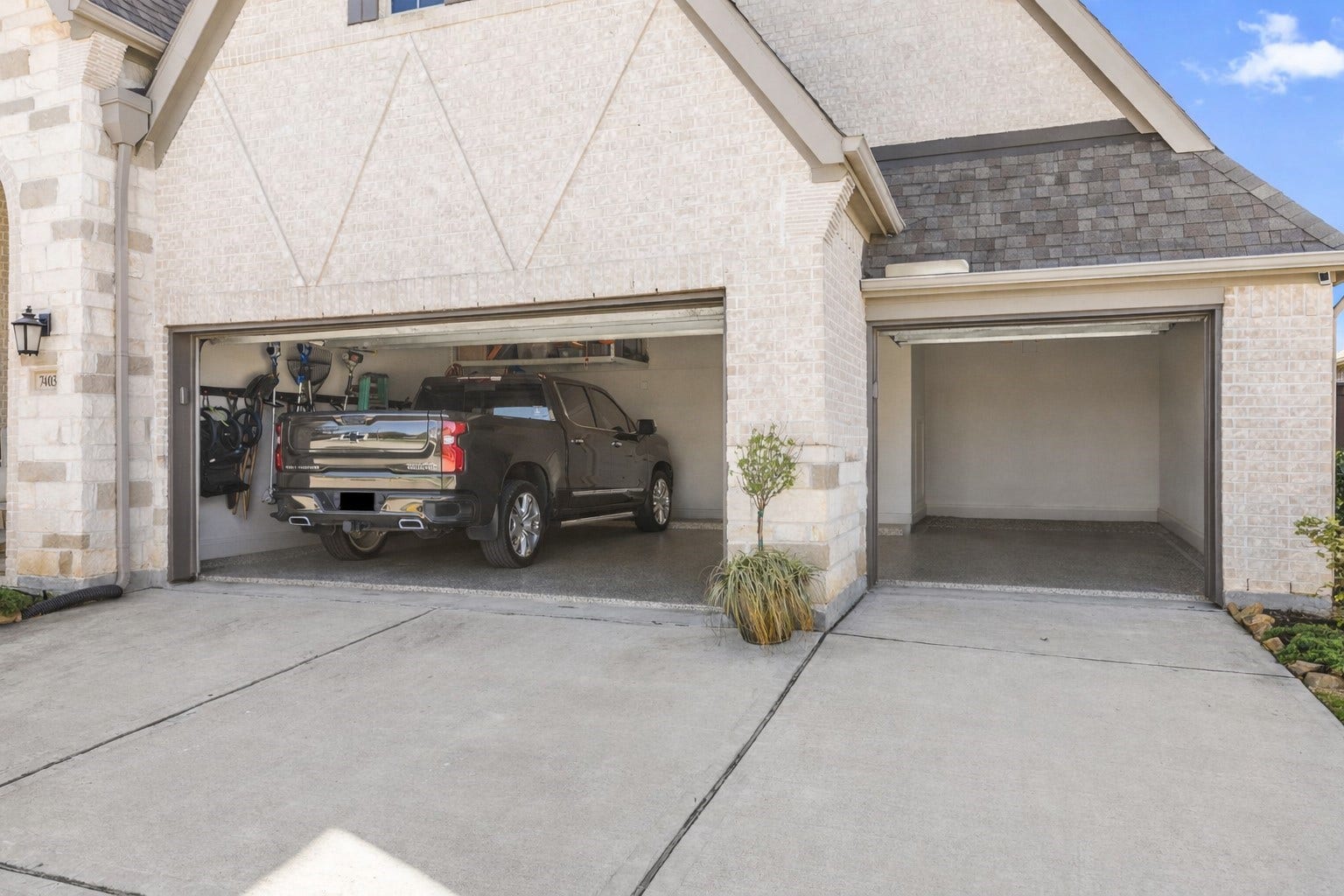 7403 Kinglet Court, Katy, TX 77493 A full size truck fits nicely in this oversized garage. Notice the coated Polyaspartic flooring