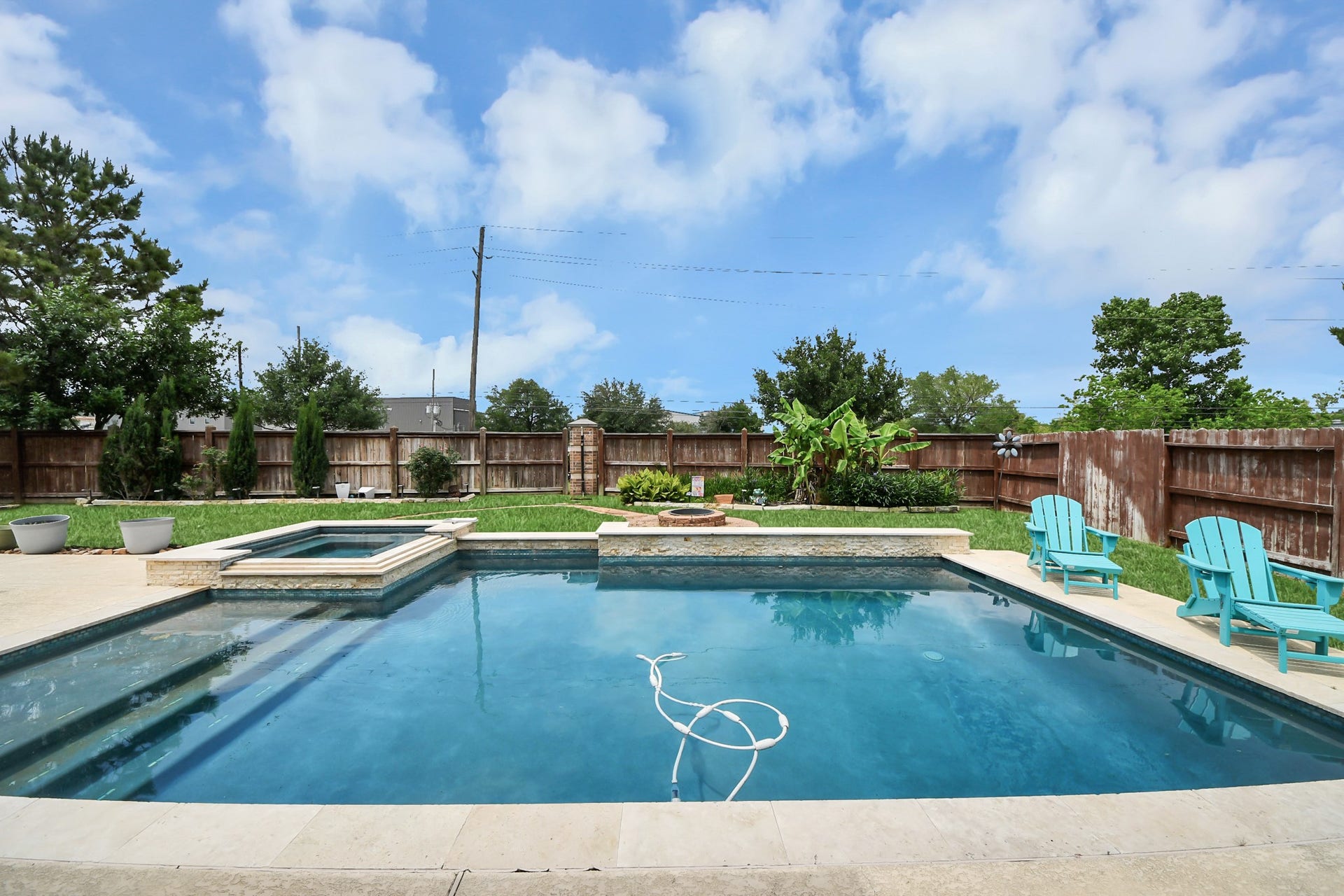 14926 Dogwood View Lane, Cypress, TX 77429 Relax in your private backyard oasis including a pool, spa, outdoor kitchen and plenty of seating to sunbathe of host your loved ones!