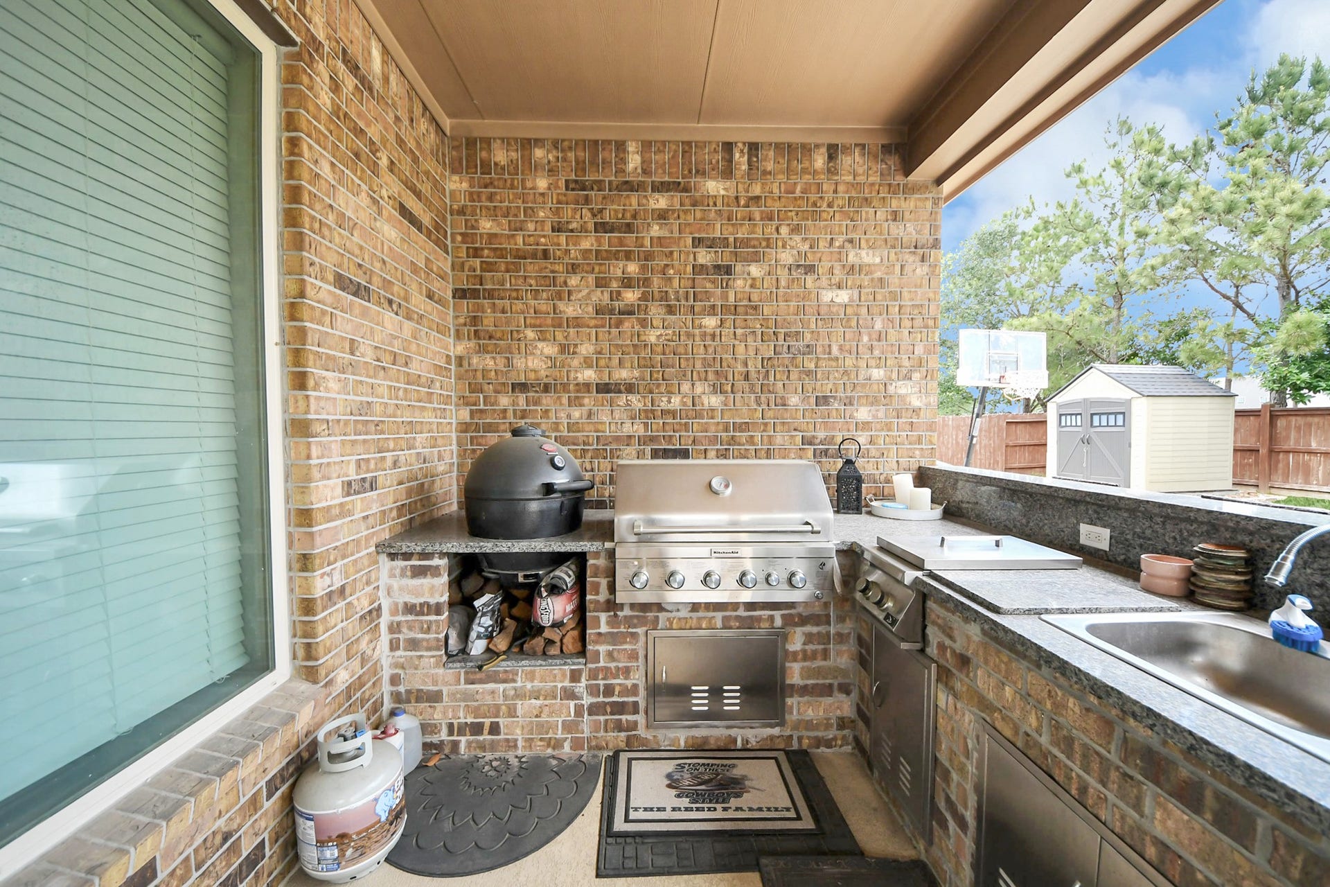 14926 Dogwood View Lane, Cypress, TX 77429 Outdoor Kitchen complete with a gas grill, green egg, sink and much more!