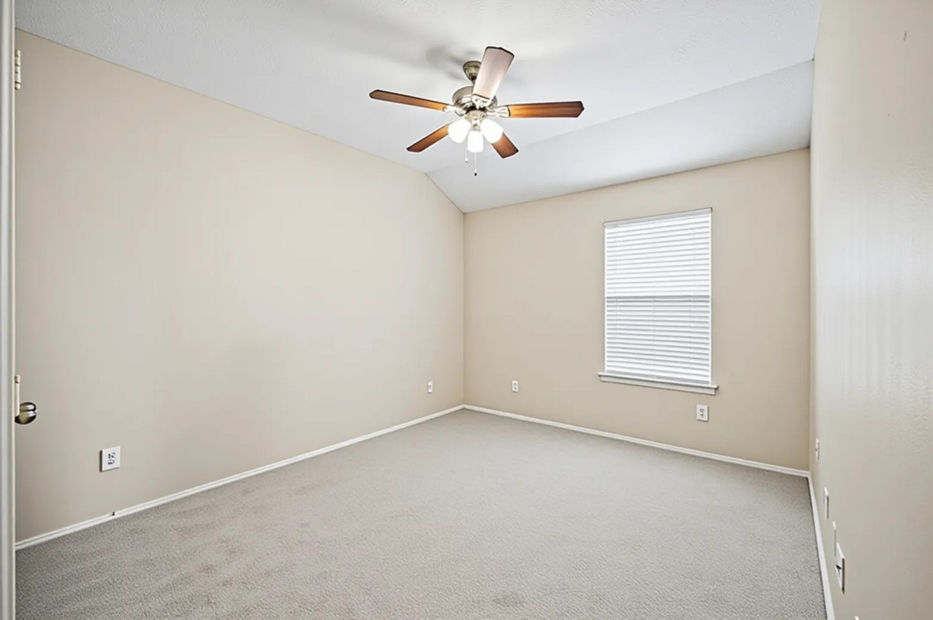 8711 Sandusky Court, Tomball, TX 77375 This photo shows a clean and versatile space of the second bedroom.