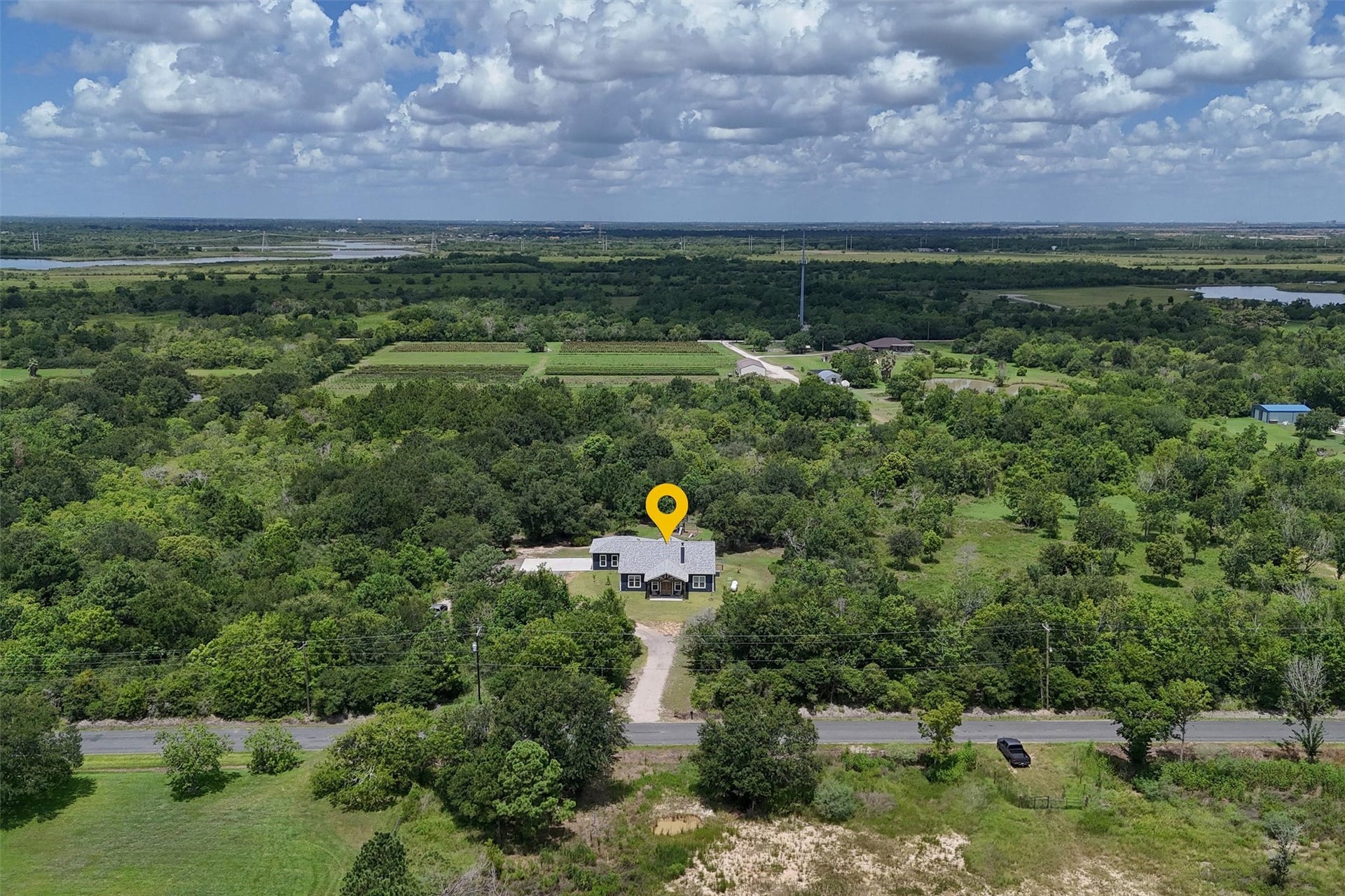 6115 San Leon Drive, Dickinson, TX 77539 Overhead view of the front of the home. Primary backs up to an orchard and Galveston Bay!