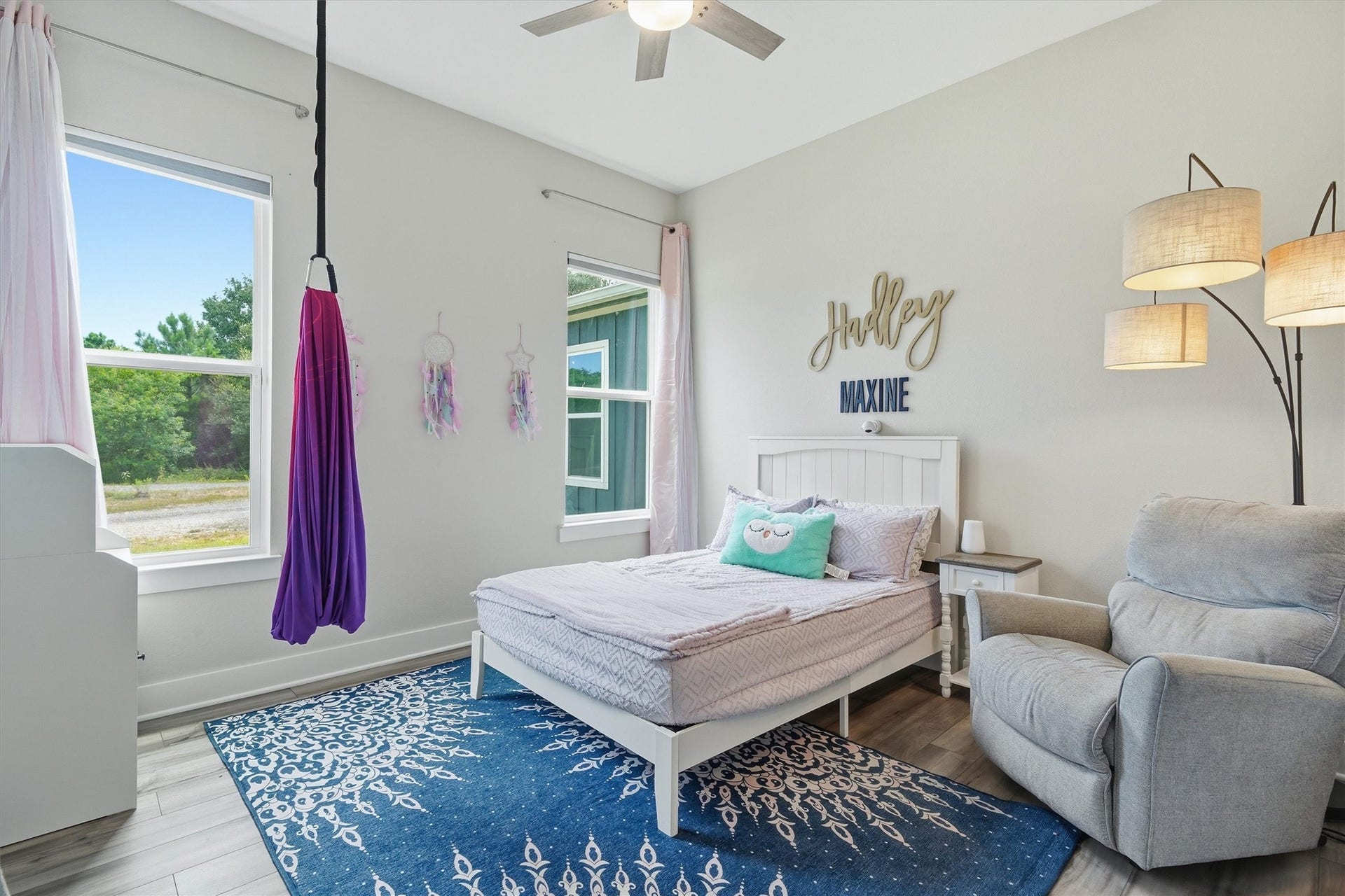6115 San Leon Drive, Dickinson, TX 77539 Third bedroom with high ceilings and two windows overlooking side yard and garage