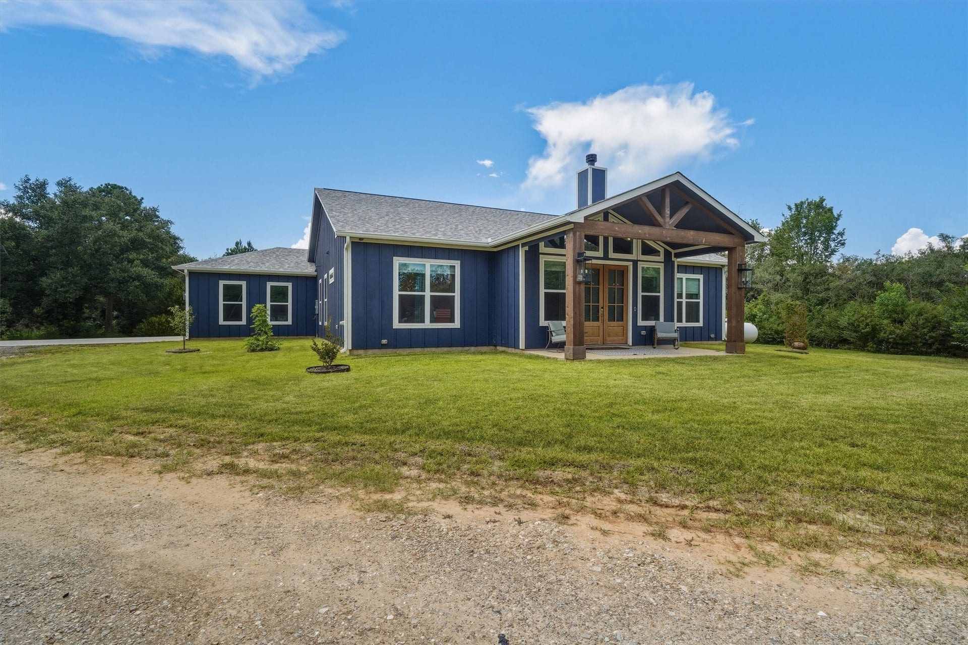 6115 San Leon Drive, Dickinson, TX 77539 Sodded front and back yard, with mature trees, on two acres!