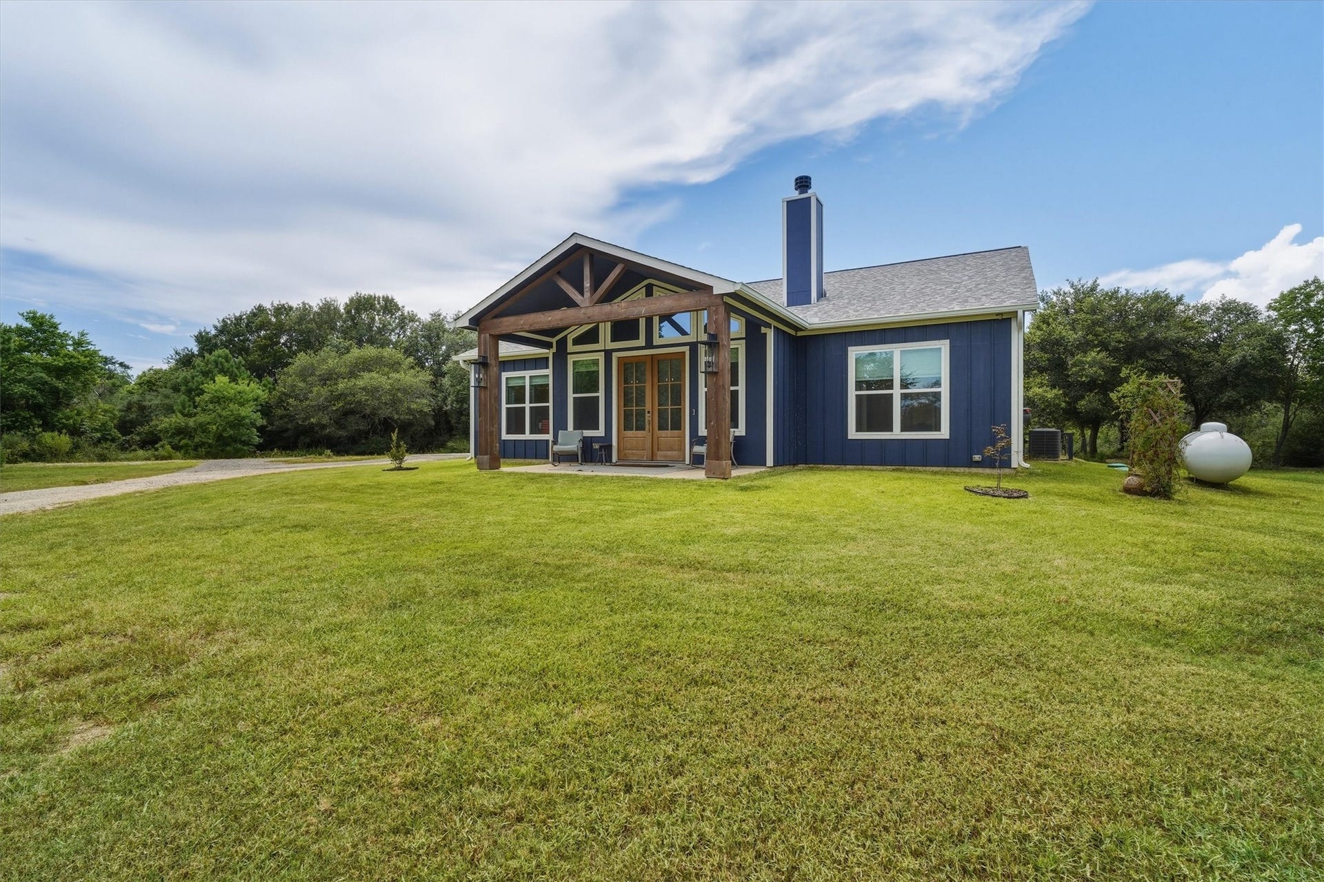 6115 San Leon Drive, Dickinson, TX 77539 3/2/2 custom built in 2024, on 2 acres, complete with circle drive and RV hook up!