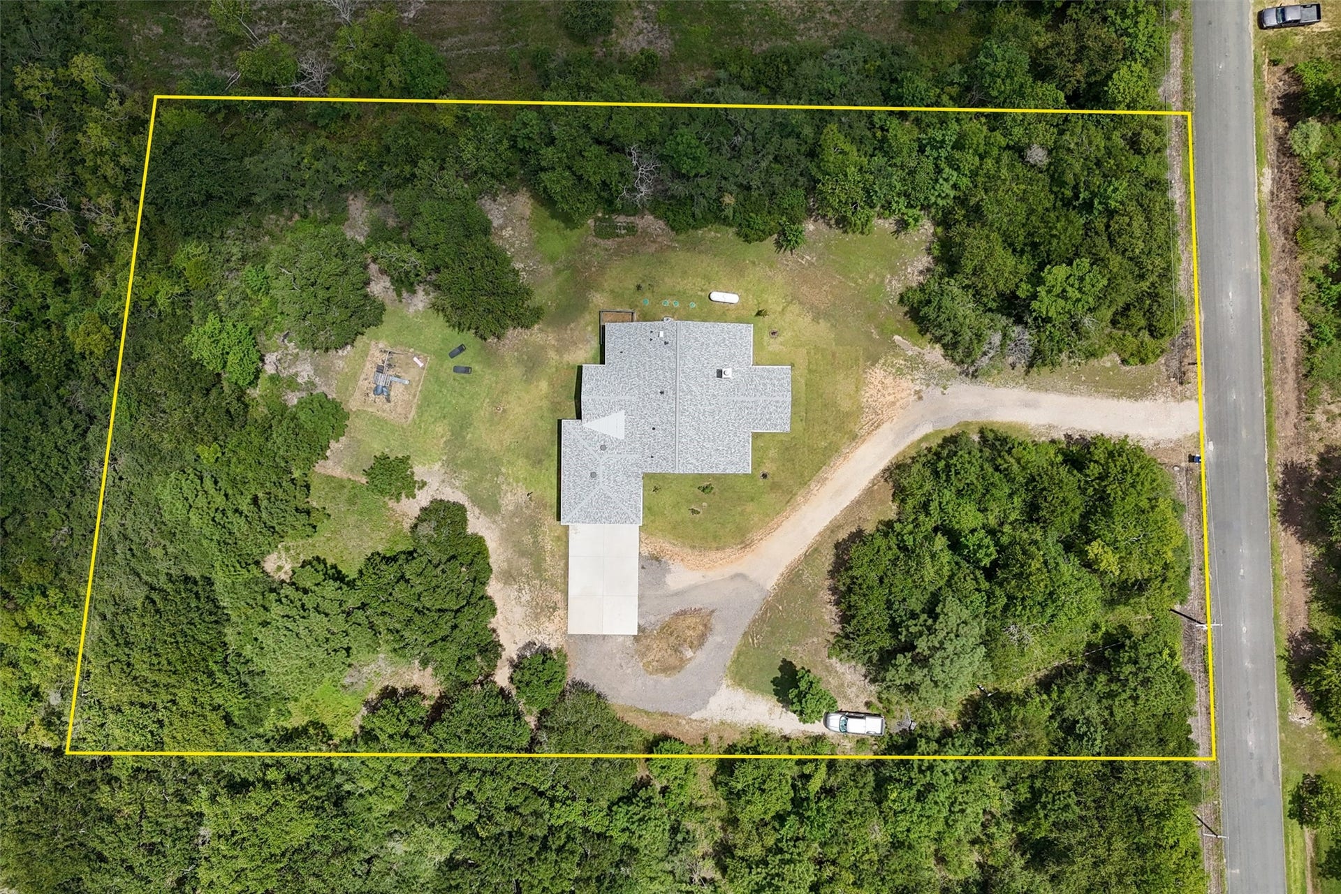6115 San Leon Drive, Dickinson, TX 77539 3/2/2 custom built in 2024, on 2 acres, complete with circle drive and RV hook up!