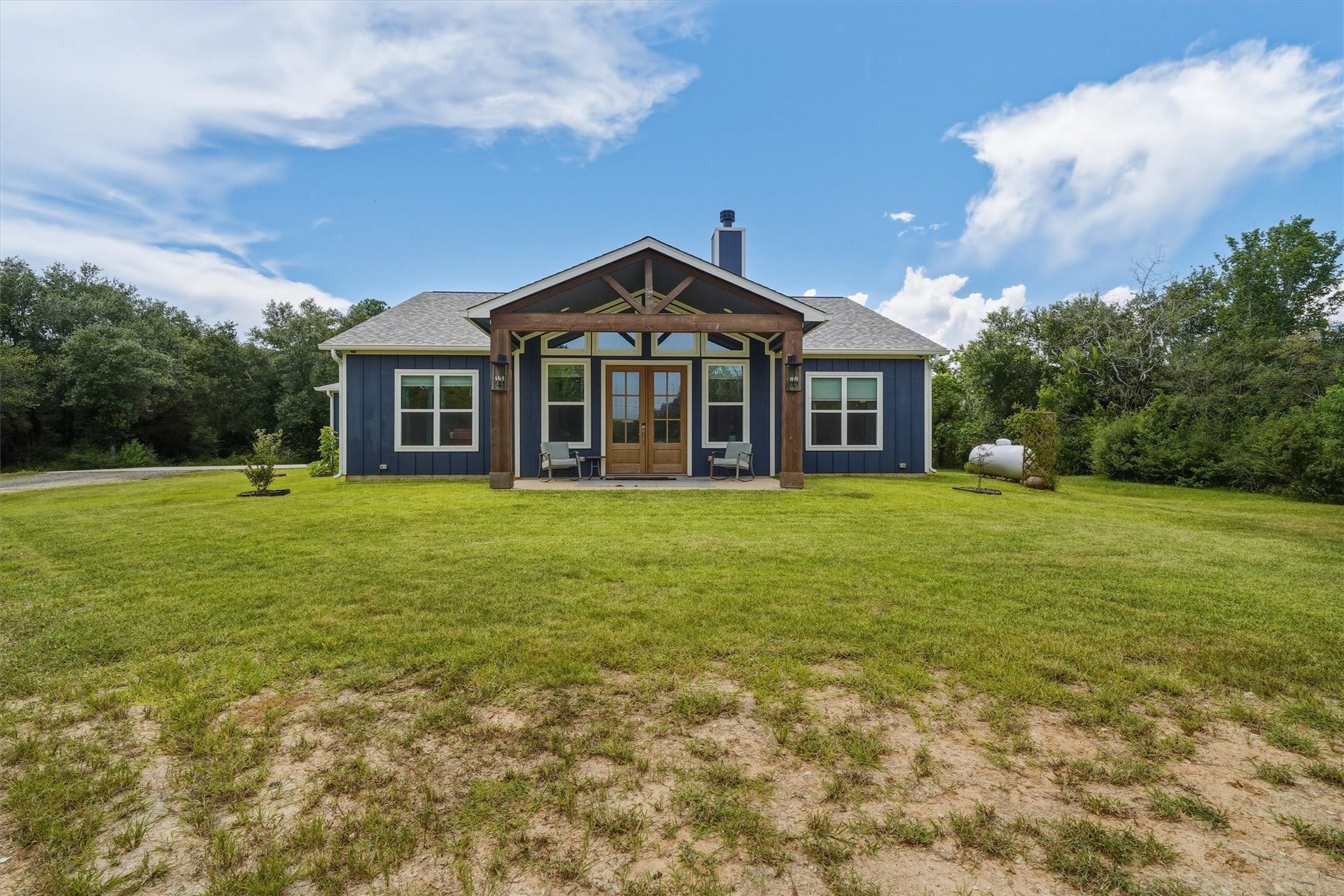 6115 San Leon Drive, Dickinson, TX 77539 3/2/2 custom built in 2024, on 2 acres, complete with circle drive and RV hook up!