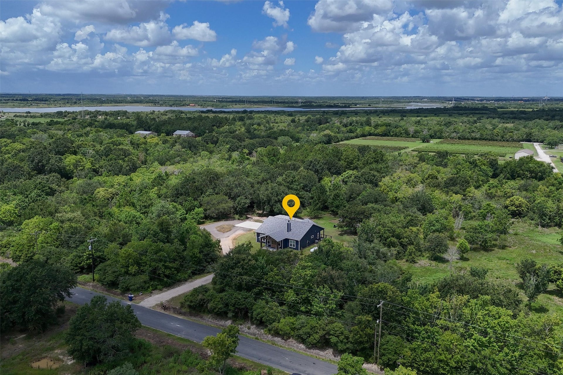 6115 San Leon Drive, Dickinson, TX 77539 Overhead view of the front of the home. Primary backs up to an orchard and Galveston Bay!