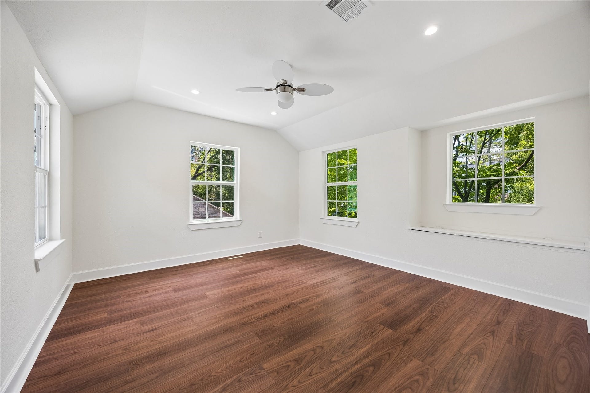 3071 Locke Lane, Houston, TX 77019 Secondary bedroom with hardwood flooring and natural light.