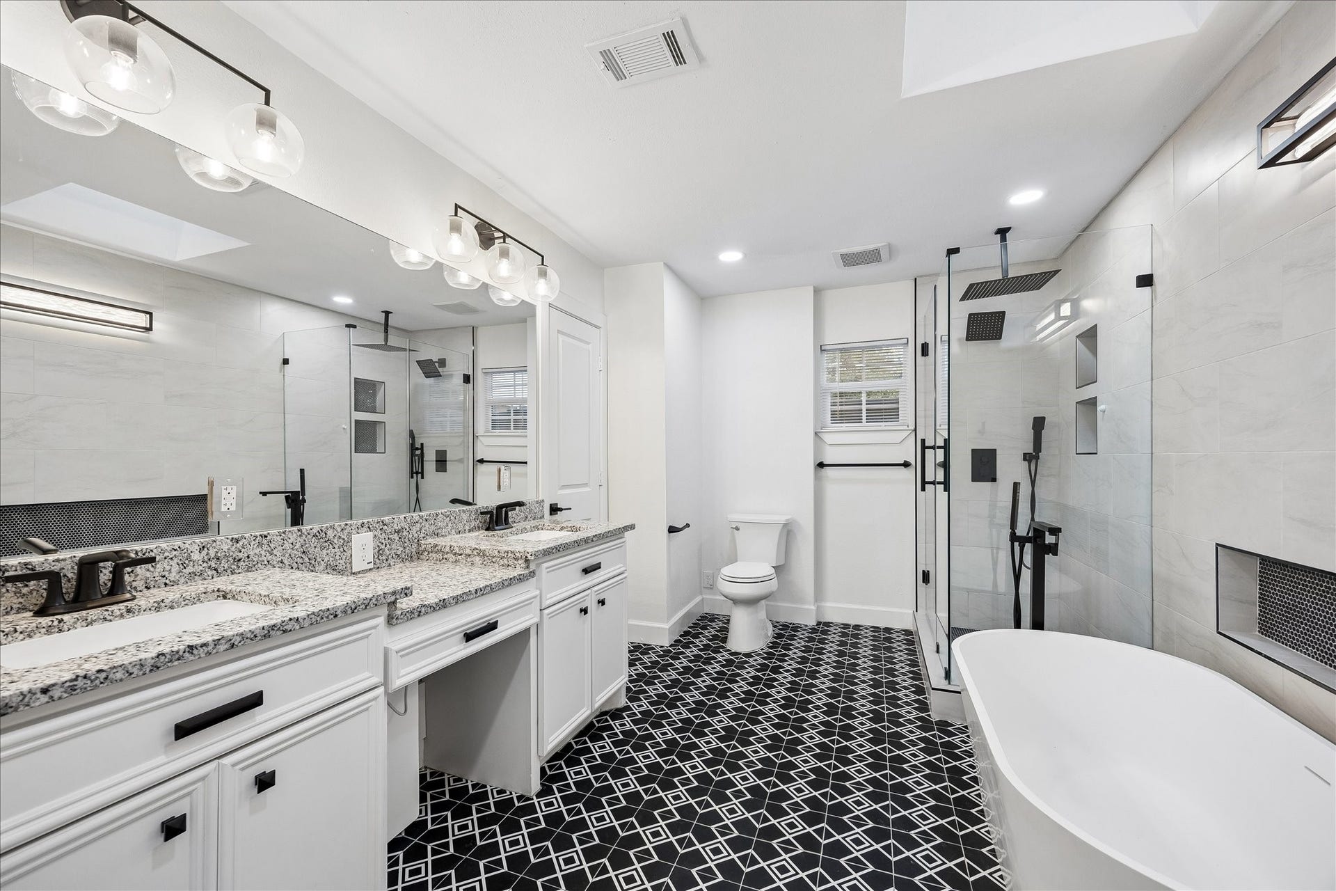 3071 Locke Lane, Houston, TX 77019 Spacious primary bathroom with dual vanities and generous layout.