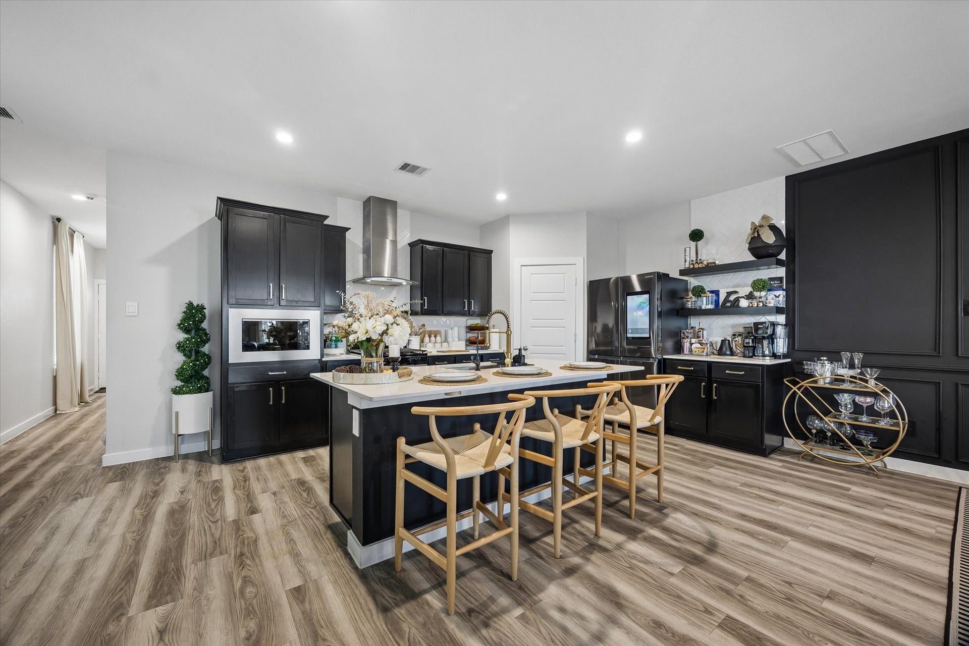 3034 Crown Gate Drive, Houston, TX 77047 Open-concept kitchen and dining area featuring modern finishes, generous cabinet space and easy flow for everyday living.