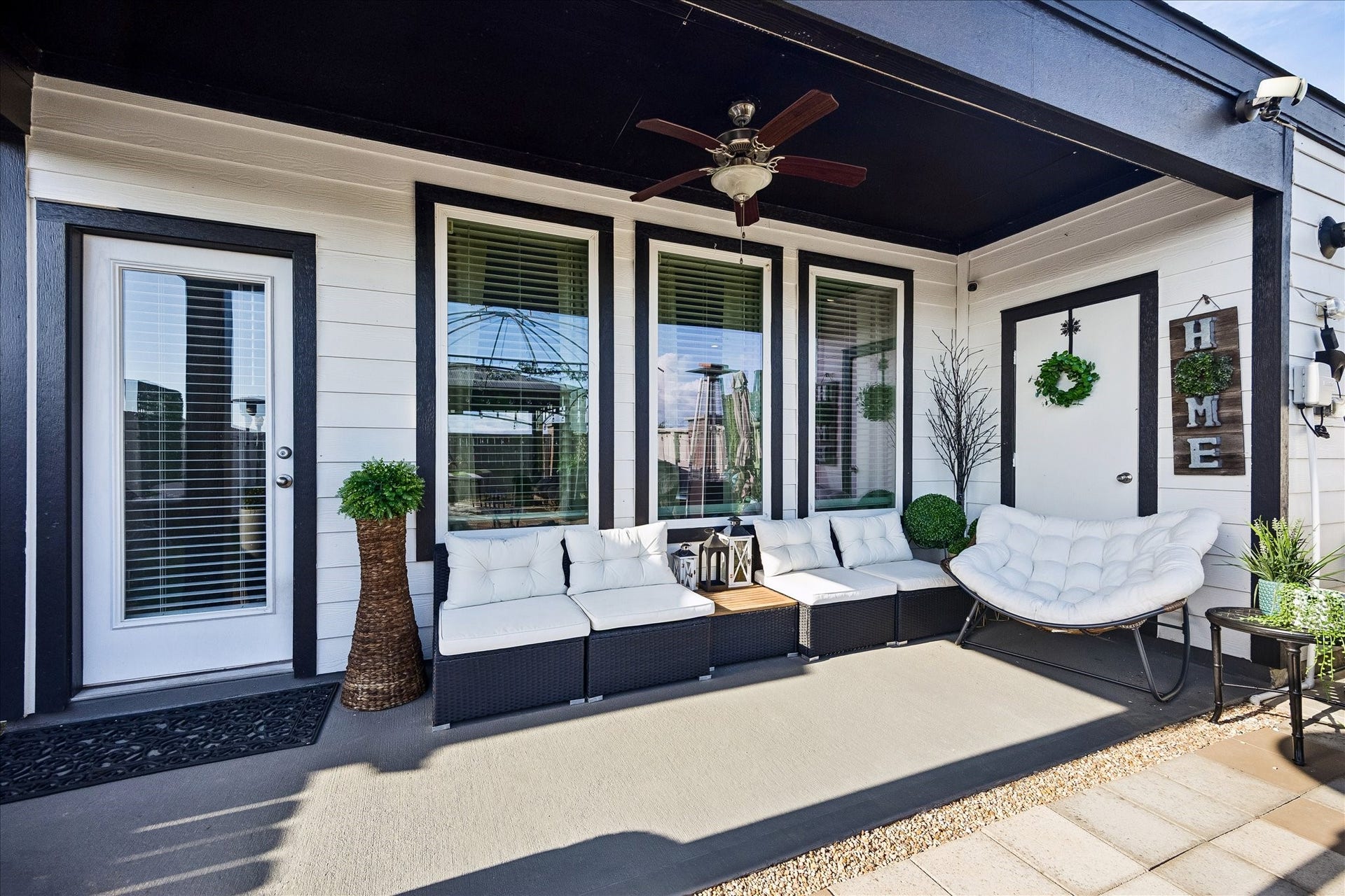 3034 Crown Gate Drive, Houston, TX 77047 Covered back patio overlooking the fenced backyard, offering a great space for relaxing, grilling or entertaining.