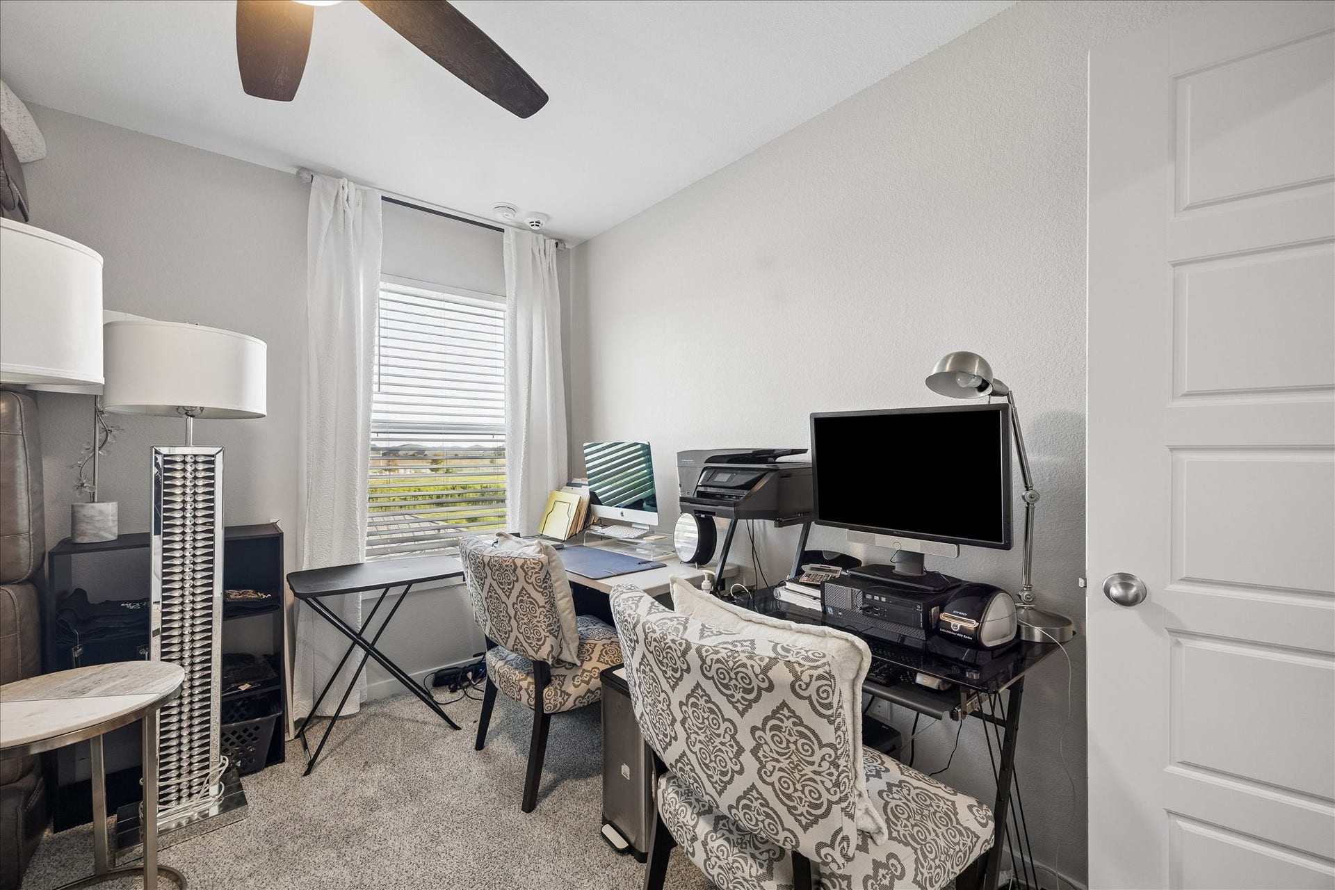 3034 Crown Gate Drive, Houston, TX 77047 Versatile secondary room currently arranged as a home office and sitting area.