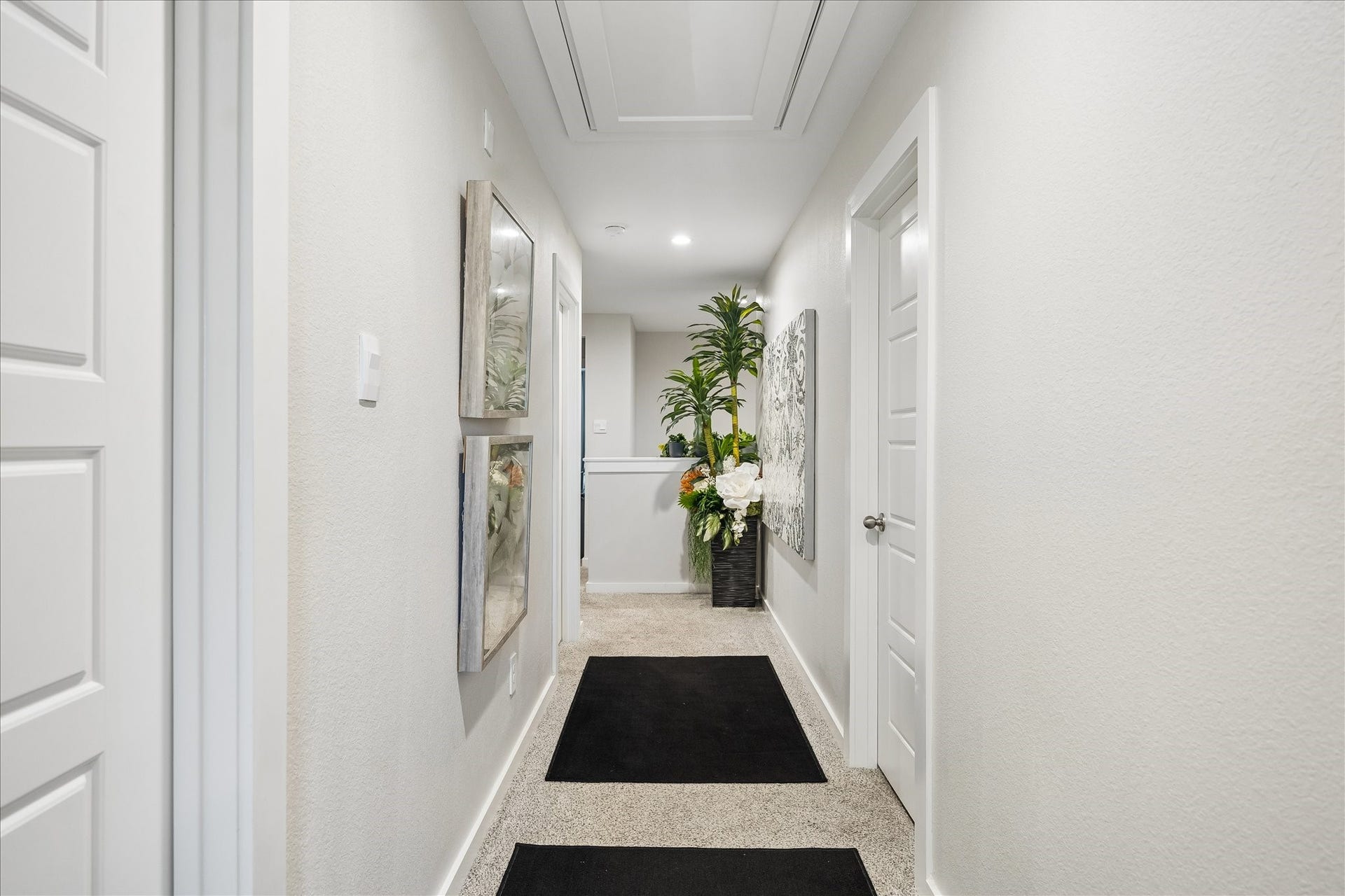 3034 Crown Gate Drive, Houston, TX 77047 Bright upstairs hallway connecting the bedrooms, bathrooms and additional living spaces.