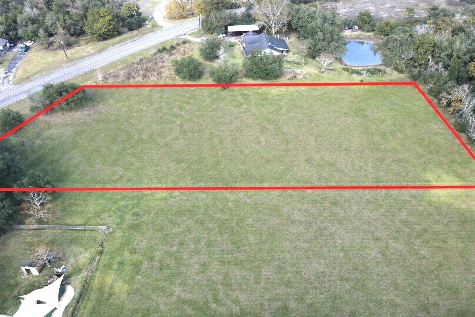 6315 Main Street, Hitchcock, TX 77563 407' deep on both sides, 230' of highway frontage and 180' on the back (red lines approximate)