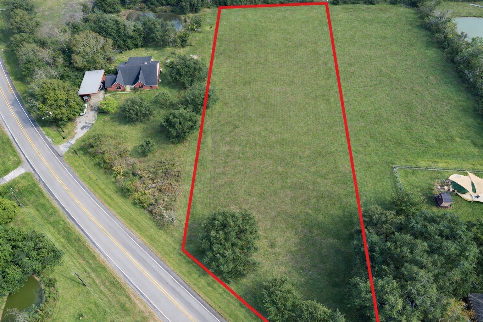 6315 Main Street, Hitchcock, TX 77563 1.97 acres available for your new home build!