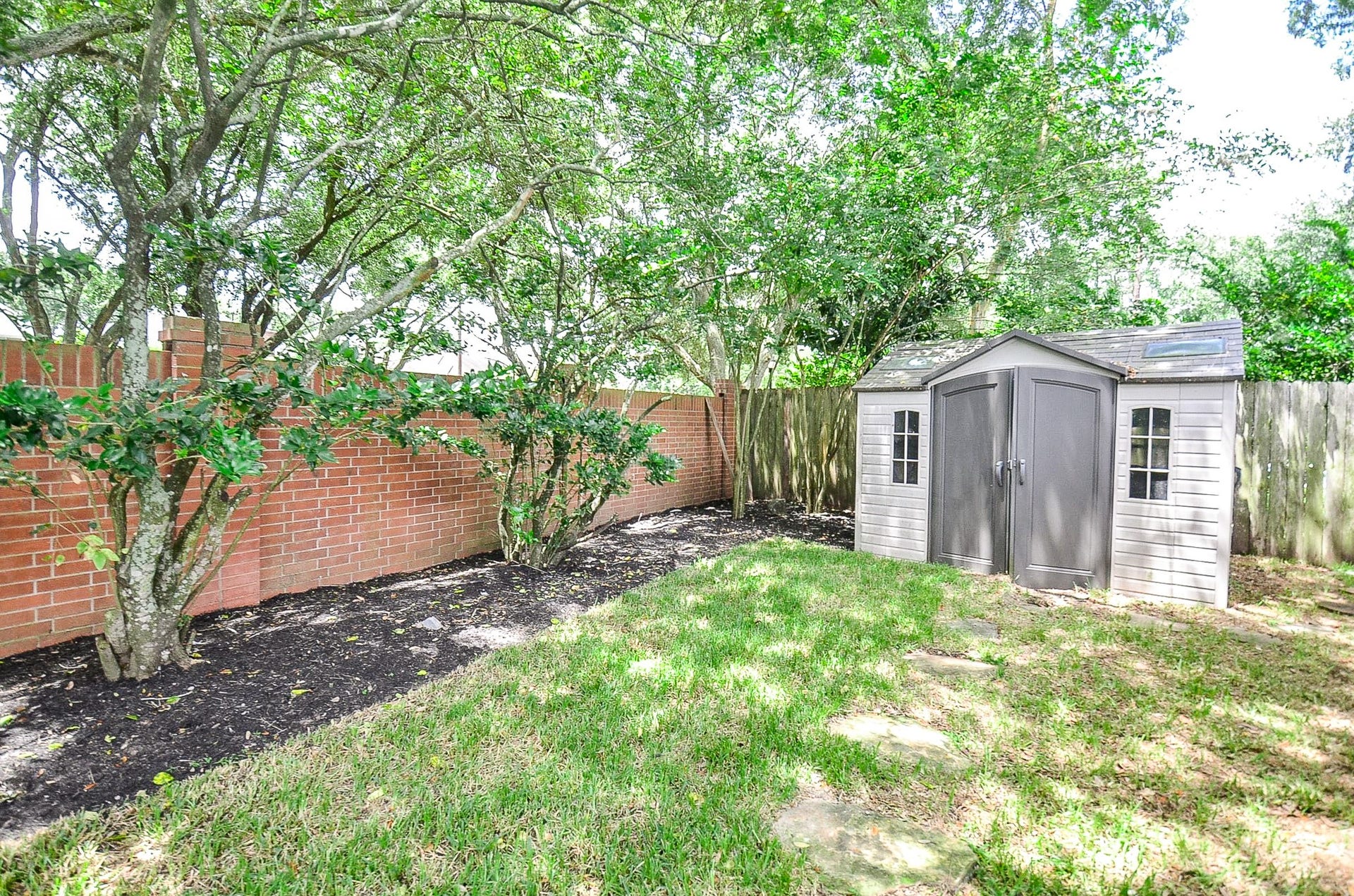 Storage Shed Included