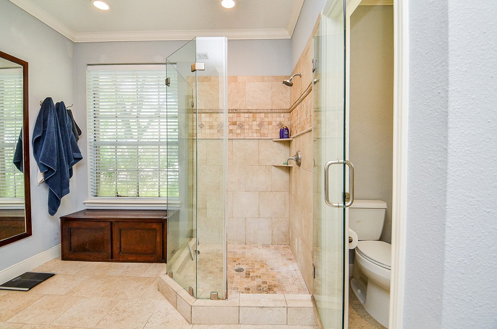 Want a free standing tub?   One can be added where the wood chest is located