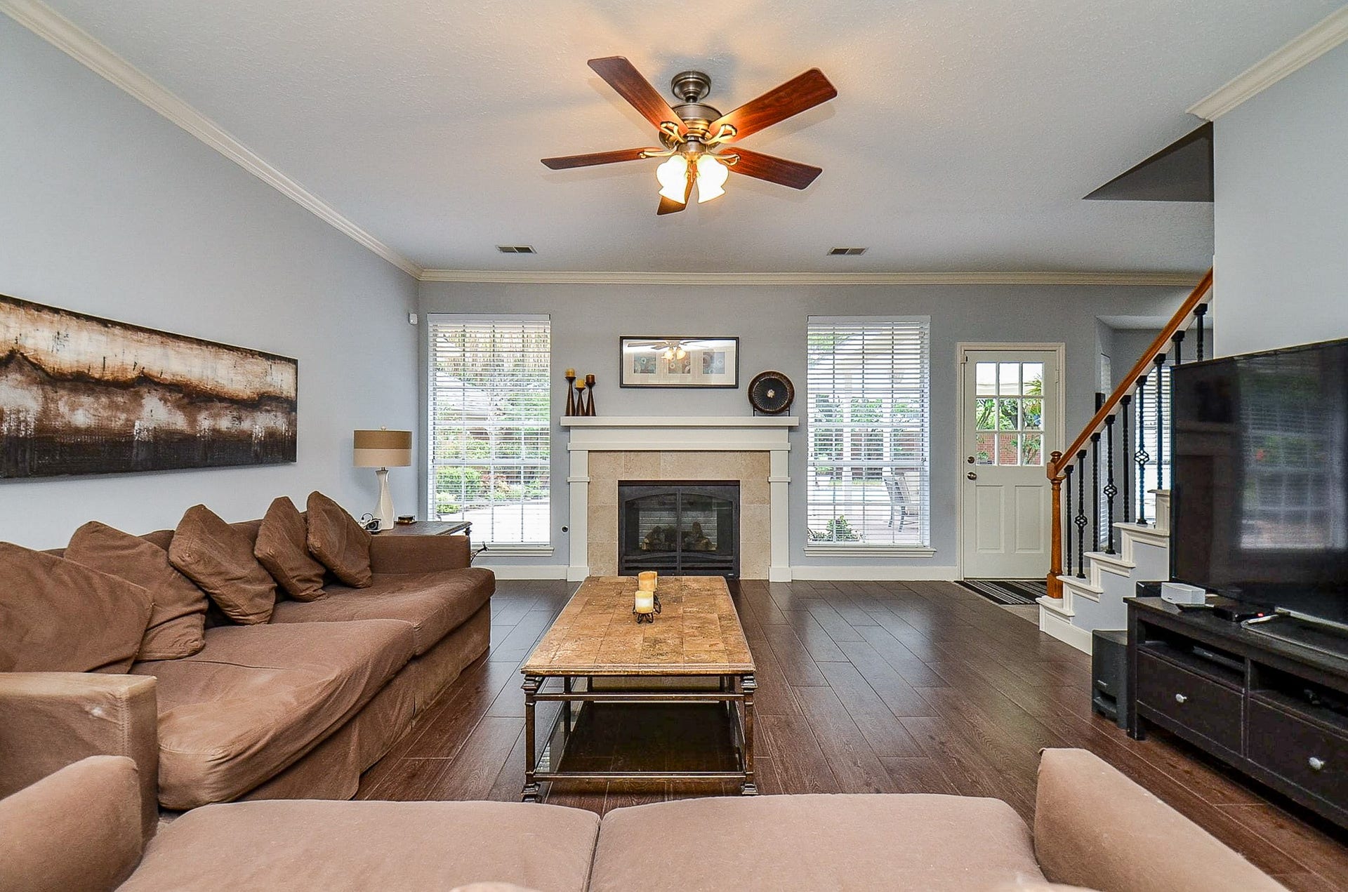 Family room has gaslog fireplace and a Beautiful view of the pool and backyard