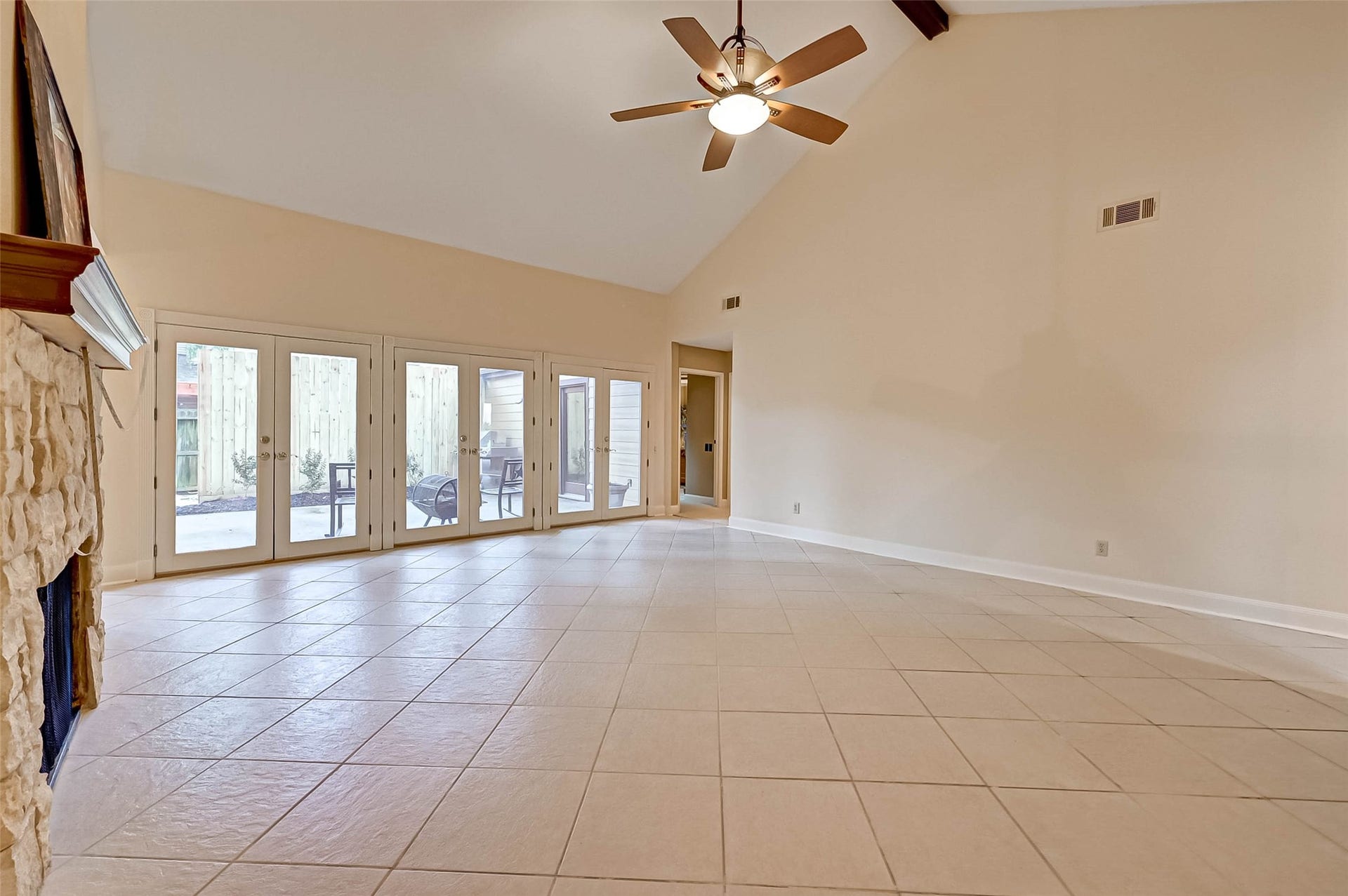Lots of light with all the windows and doors overlooking the patio.