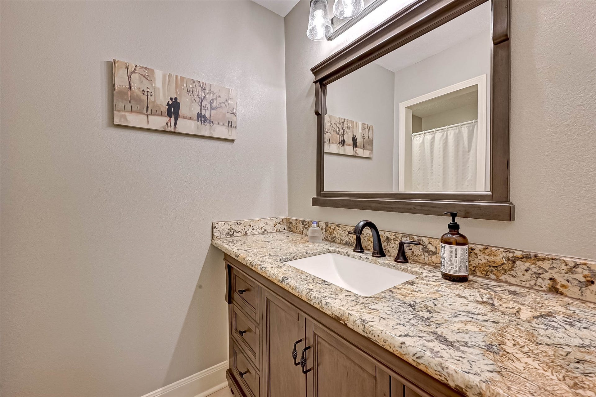 Guest bathroom with granite.