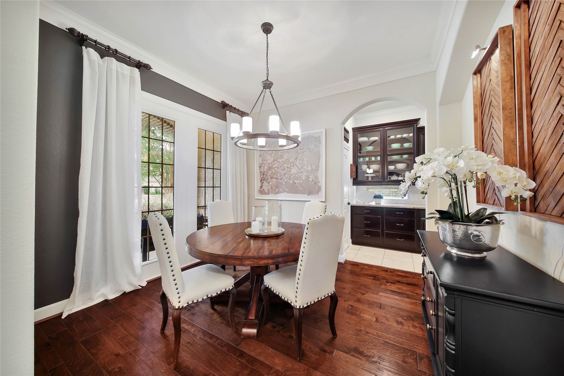 The formal dining room opens to a convenient butlers pantry.