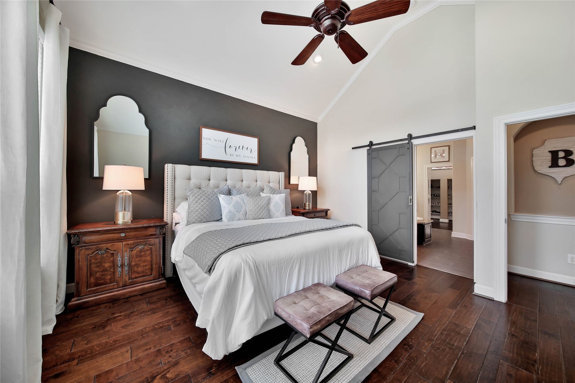 The primary suite is a wonderful escape for two, offering a peaceful retreat to relax, unwind, and recharge.