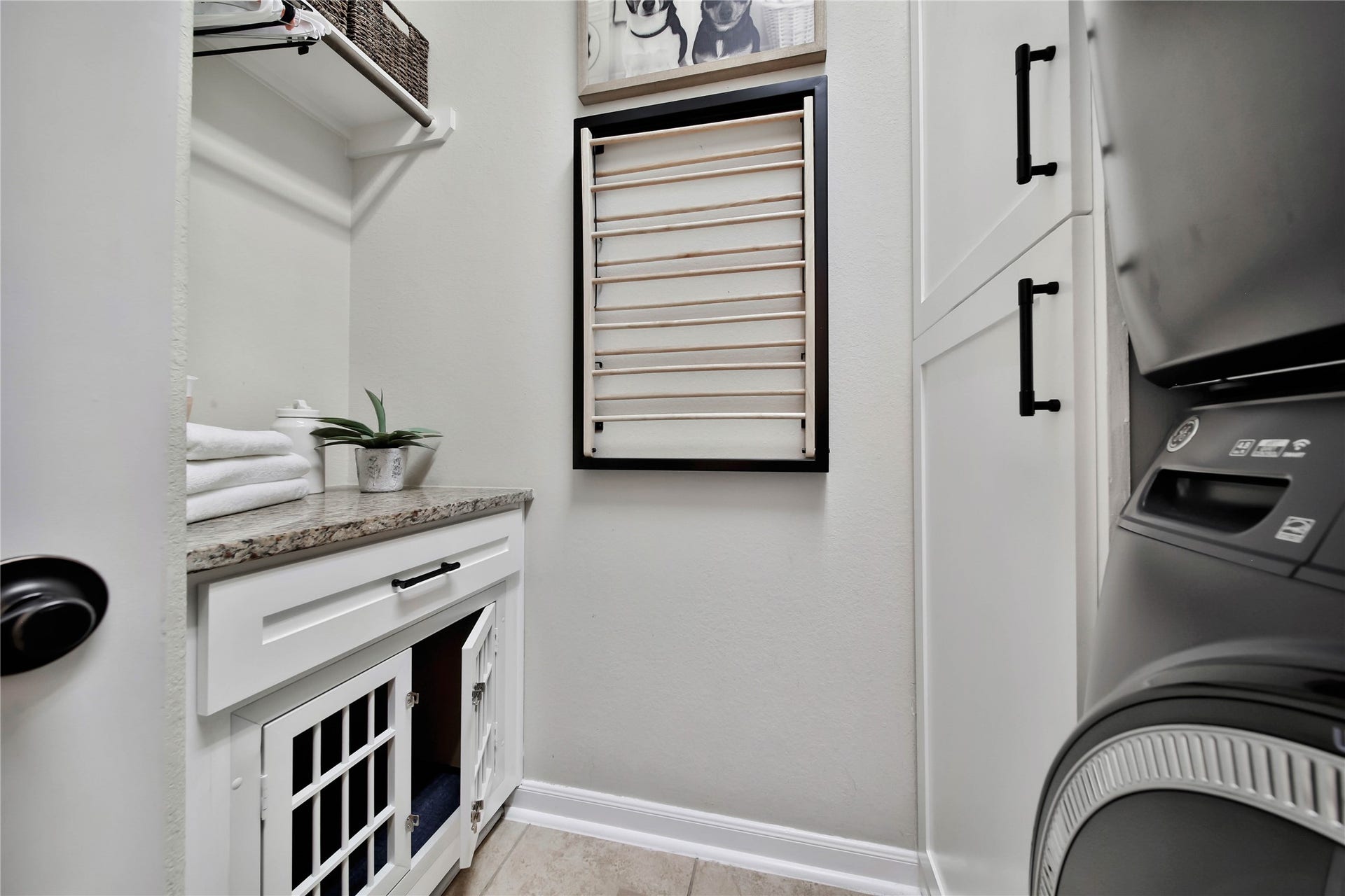 One of the custom built-ins includes a dedicated crate space for your furry family members, adding thoughtful convenience for pet lovers.