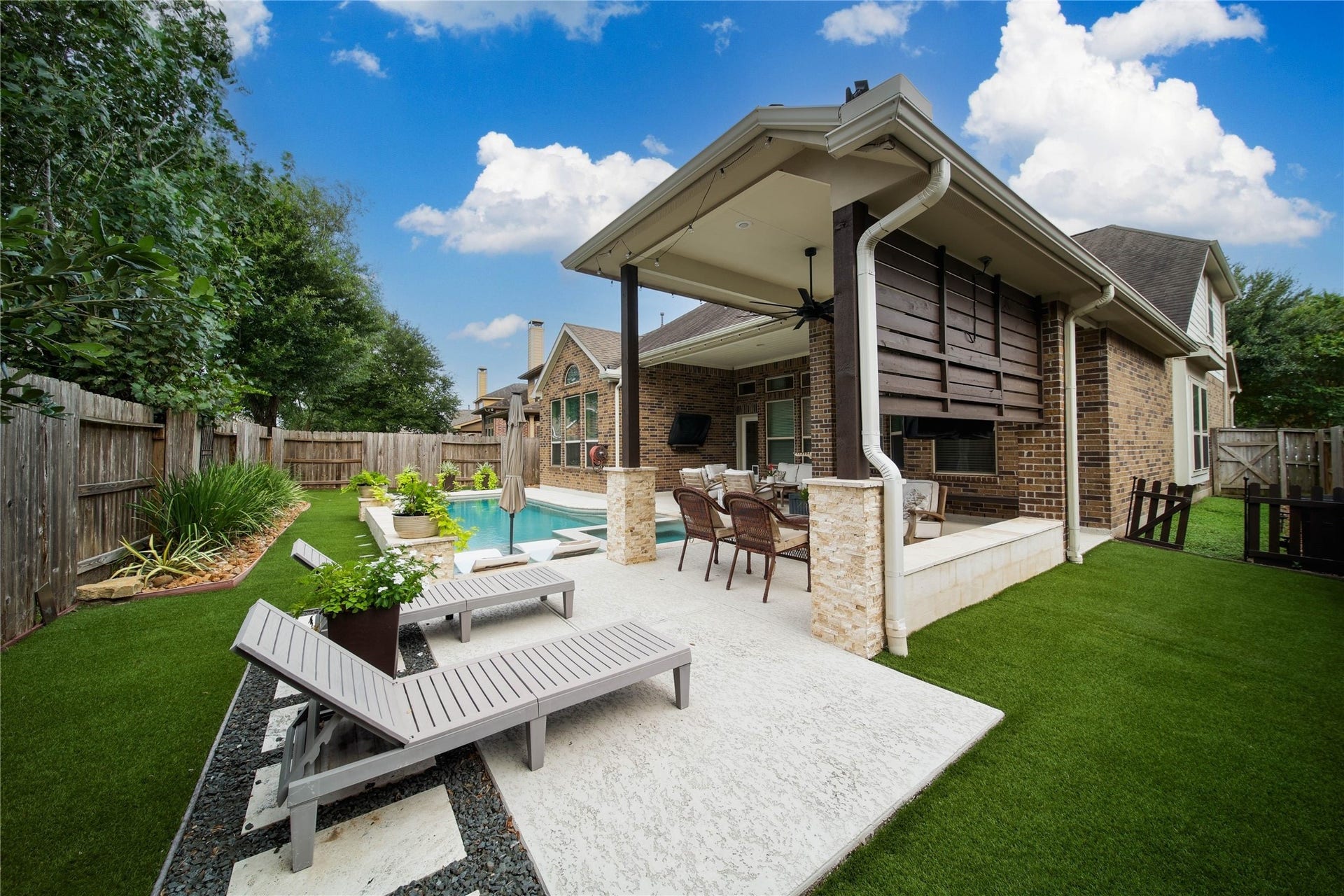The extra flatwork offers a great place to lounge, soak up the sun, and enjoy the outdoors.