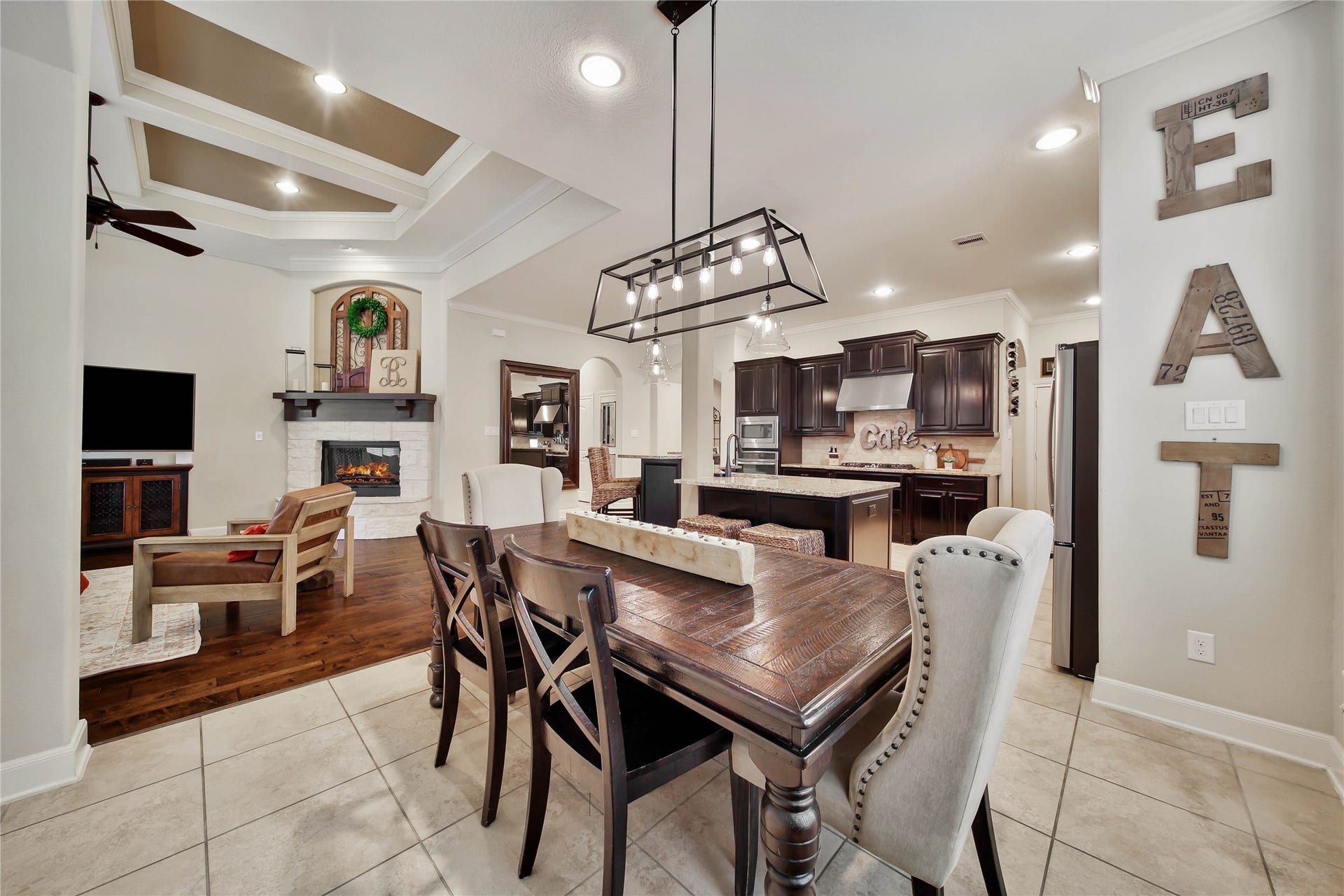 The casual dining area provides the perfect space for everyday meals, morning coffee, and gathering with family and friends.