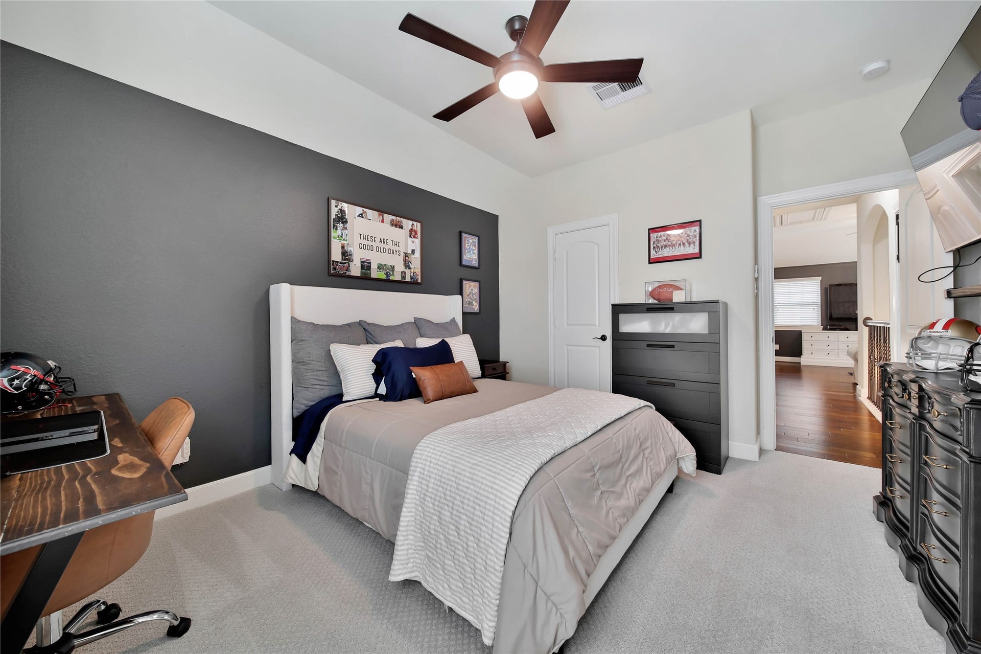 This bedroom has an adjoing bathroom.