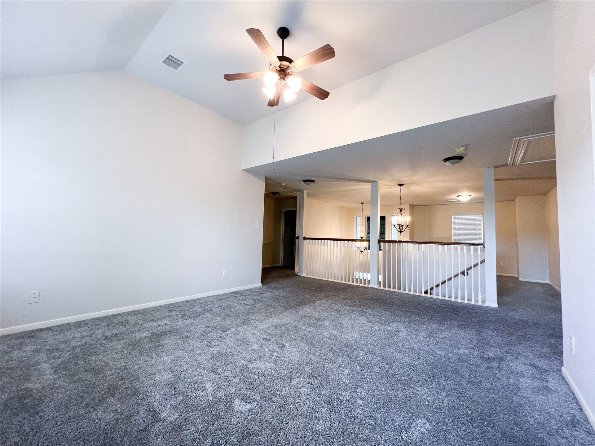 908 Azalea Pointe, League City, TX 77573 Spacious and inviting, the second-floor game room offers a versatile space perfect for entertainment and relaxation.