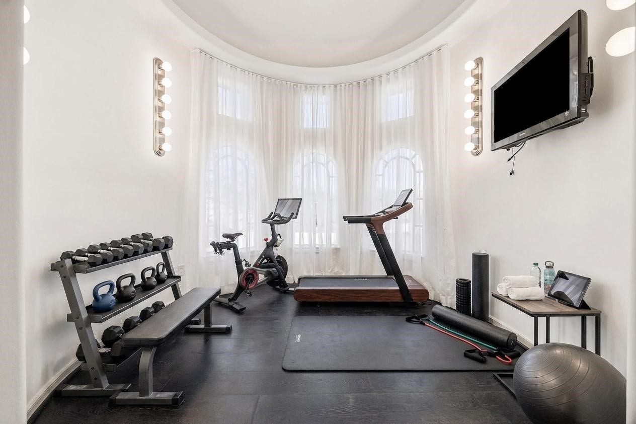 VIRTUALLY STAGED - 'cupola' room is an ideal spot for an exercise studio - with wall-mount TV included