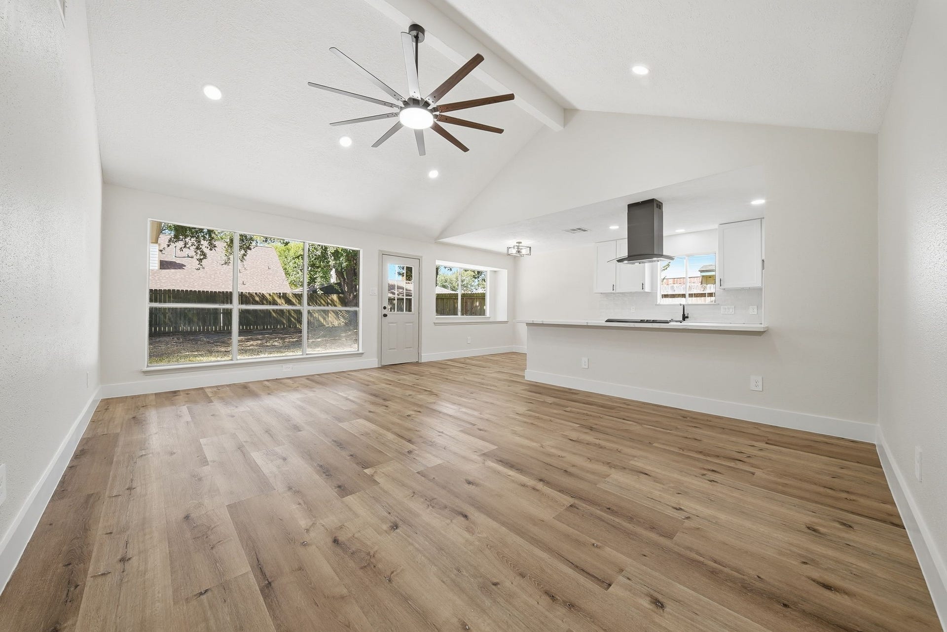 3816 Youpon Drive, La Porte, TX 77571 The open-concept and recess lighting through layout seamlessly connects to a modern kitchen, perfect for entertaining.