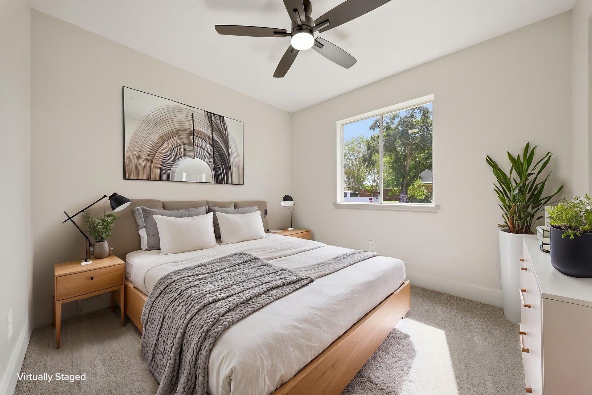 3816 Youpon Drive, La Porte, TX 77571 Bright and airy bedroom with modern cozy bed, and a large window offering natural light and scenic views.