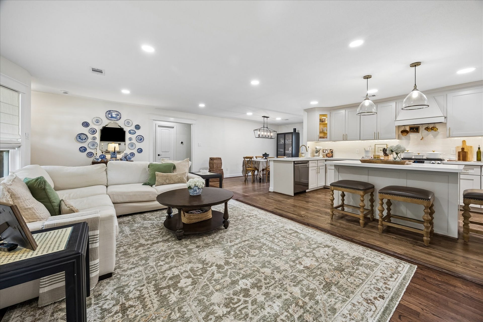 Alternate view of family, kitchen, and dining from