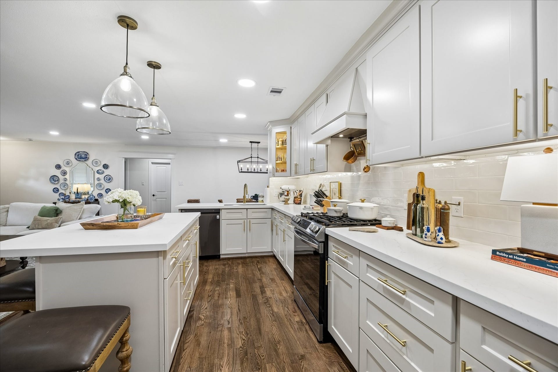 Gas cooking, drawer storage, & pendant lights at Island open to family