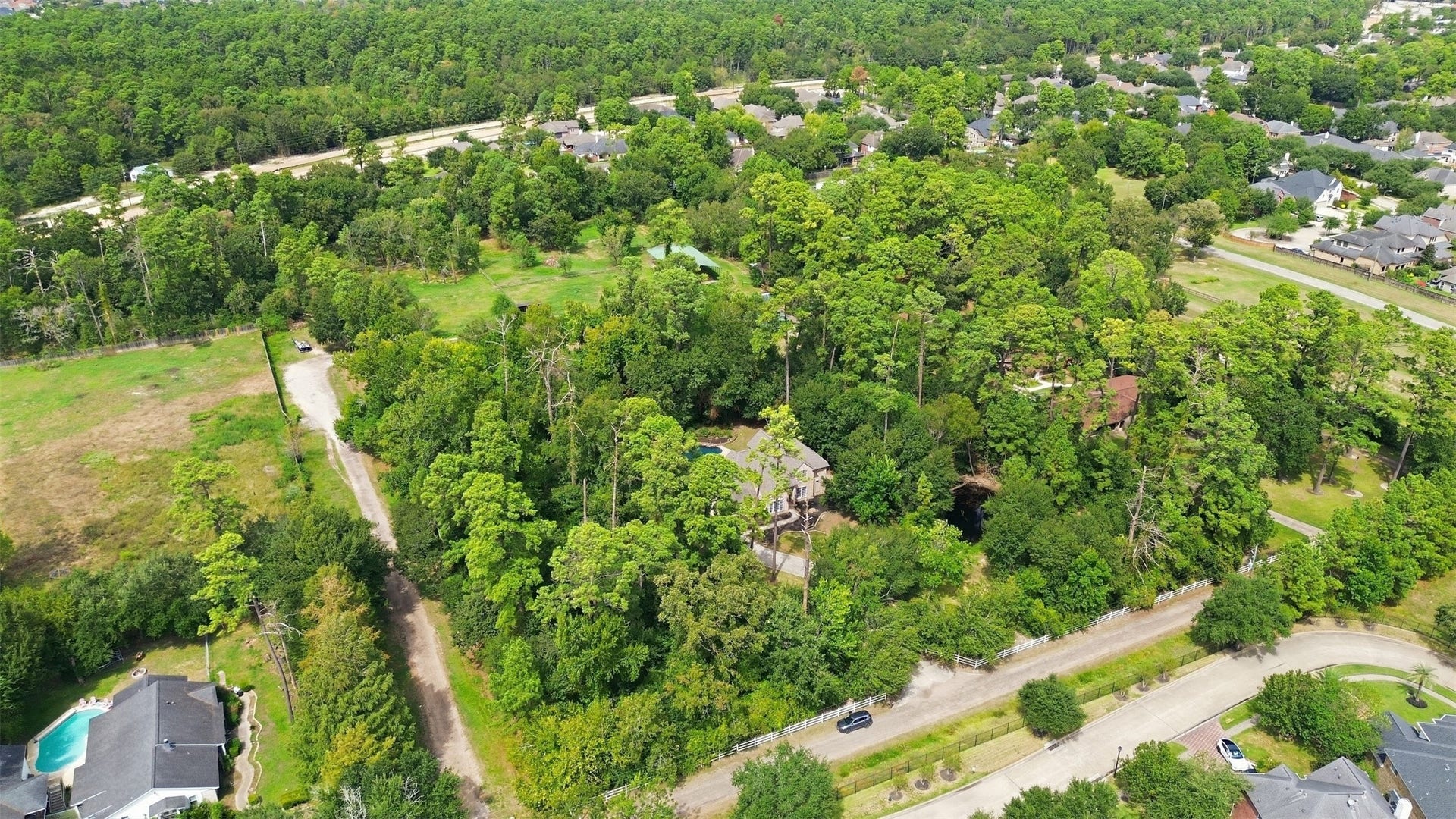 Pine Dr sits in a quiet, wooded pocket of Cypress, and the immediate surroundings are a mix of acreage homes, small businesses, and nearby established neighborhoods.